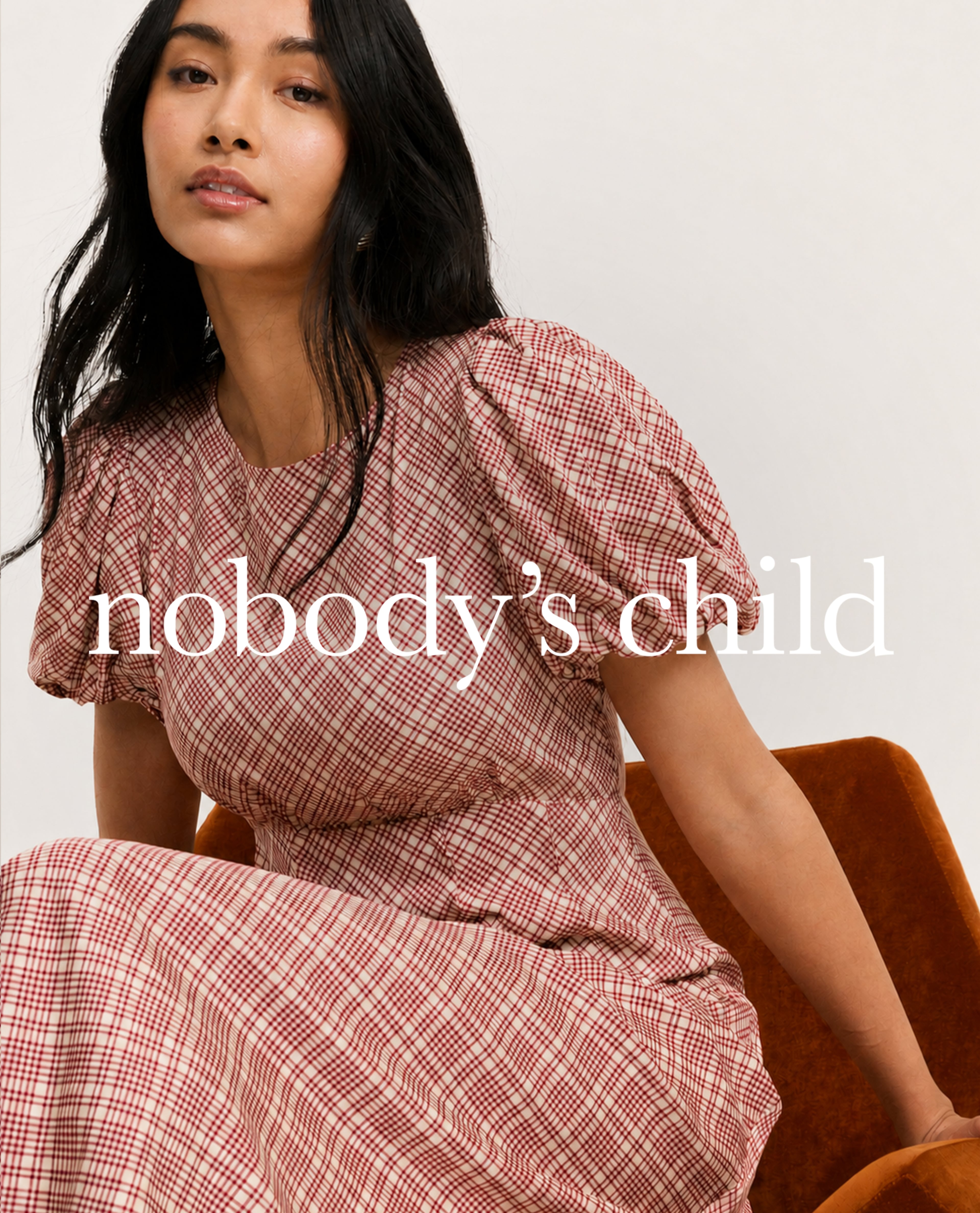 model wearing check dress nobody's child