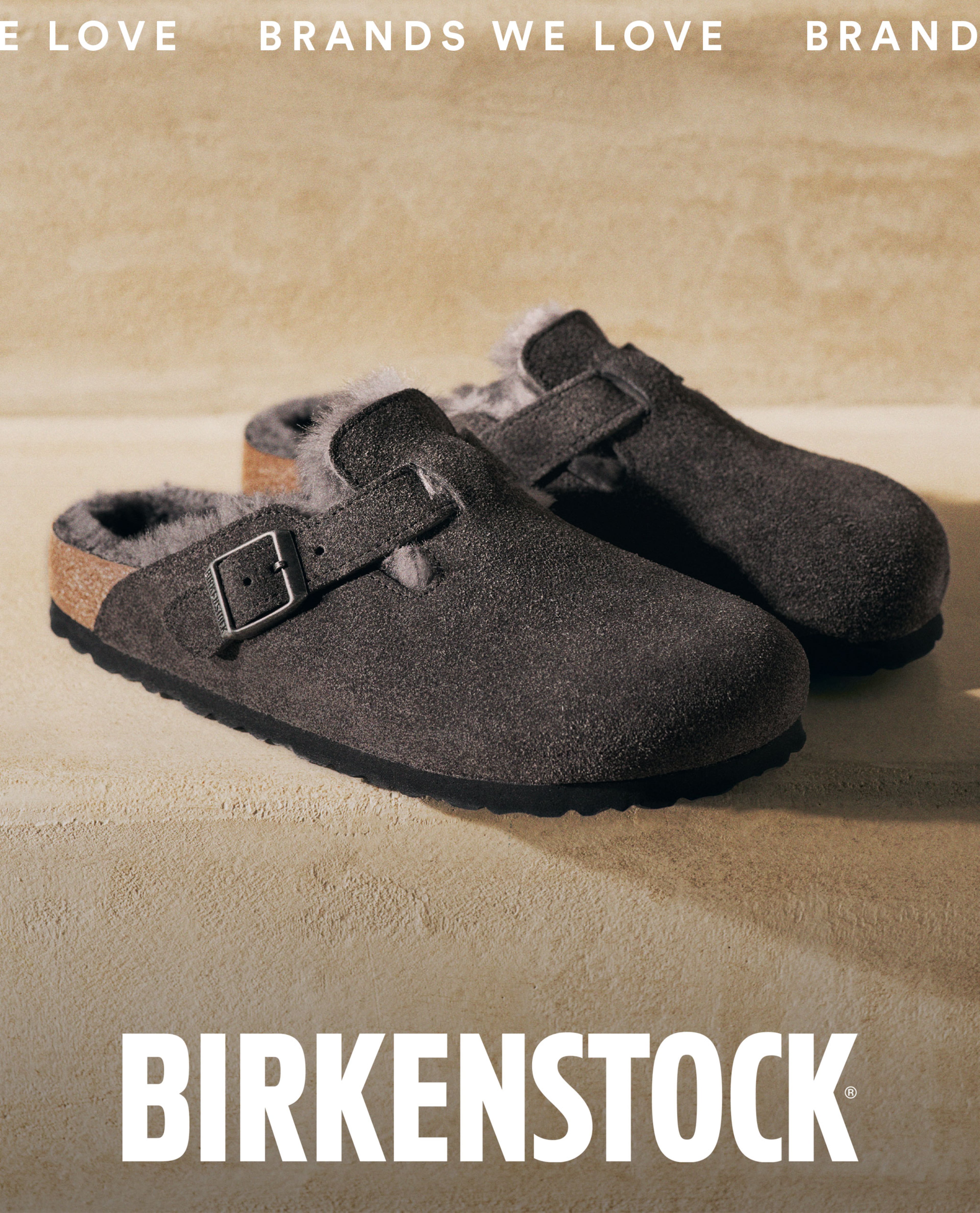 brown birkenstock slippers on brown floor