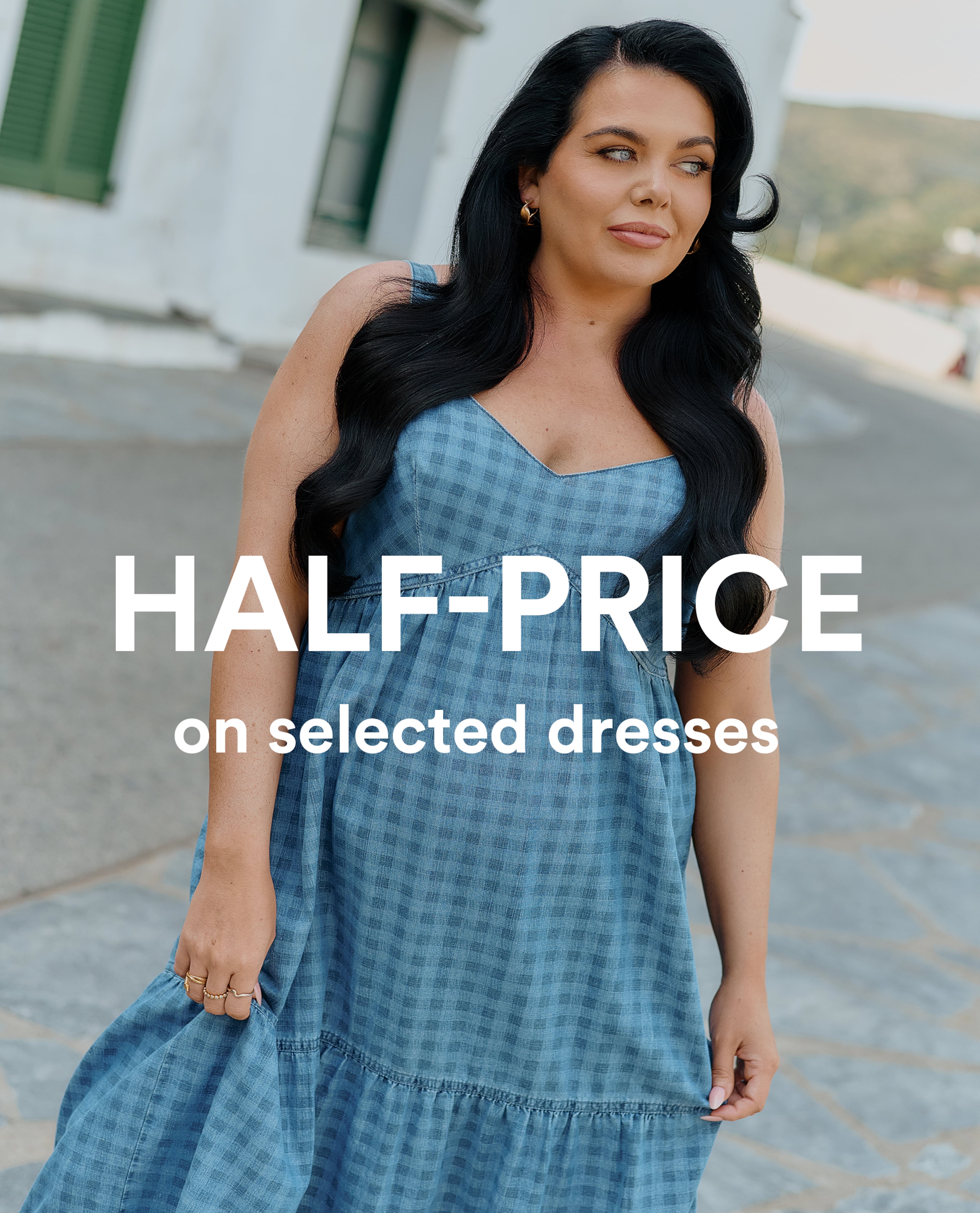 Half-price on selected dresses. Scarlett Moffatt wears Blue Gingham Sleeveless Denim Midaxi Dress