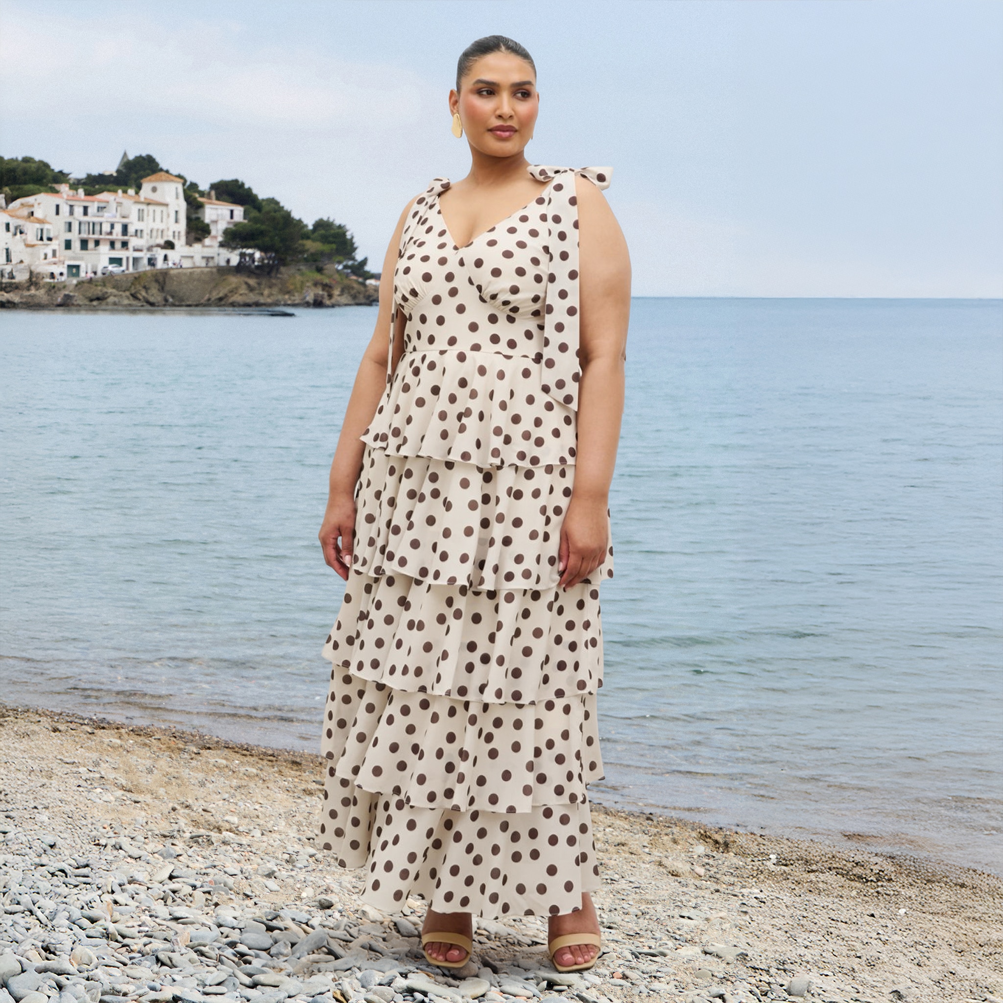 Model wears spot maxi dress