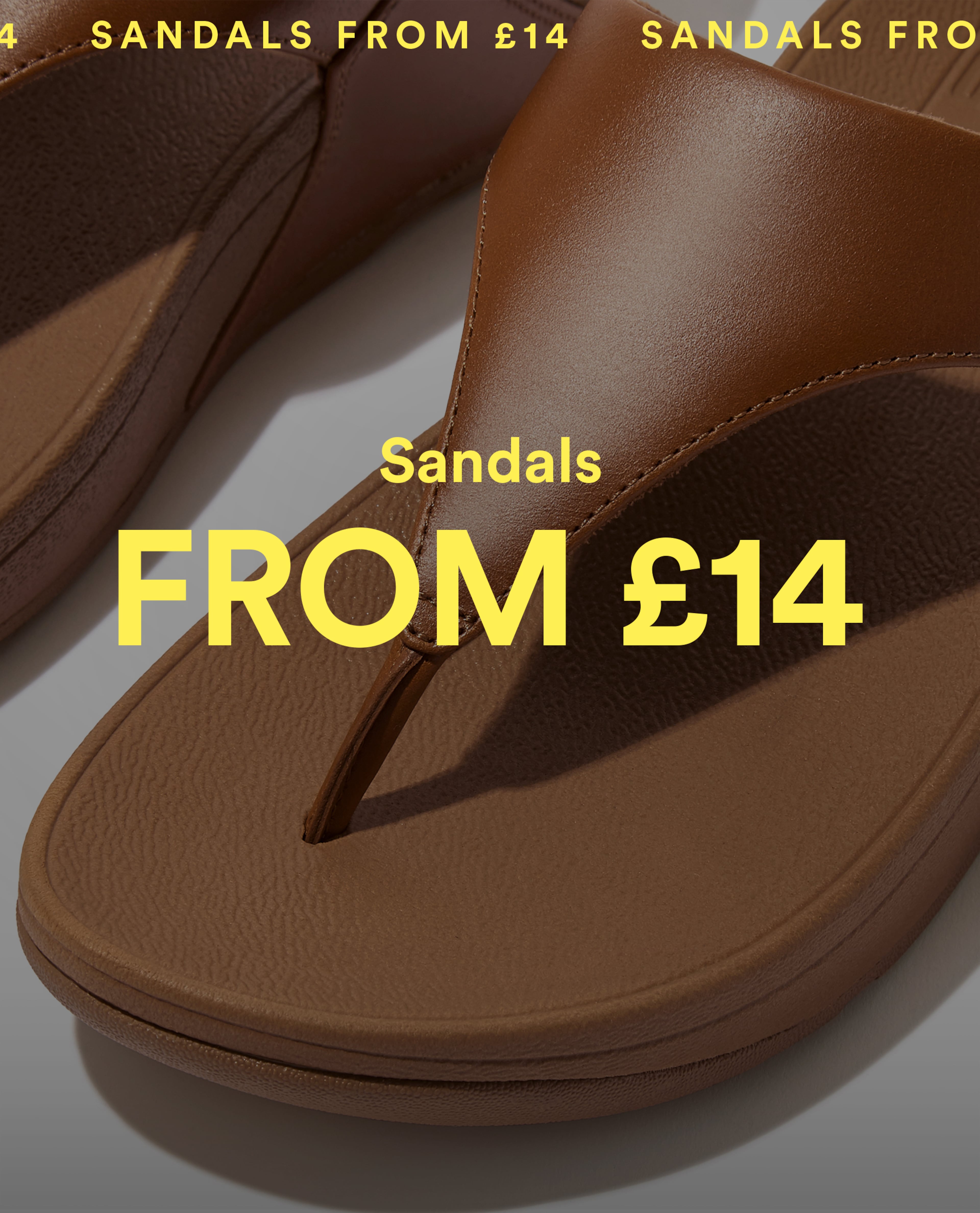 Close-up of brown sandals promoting sandals