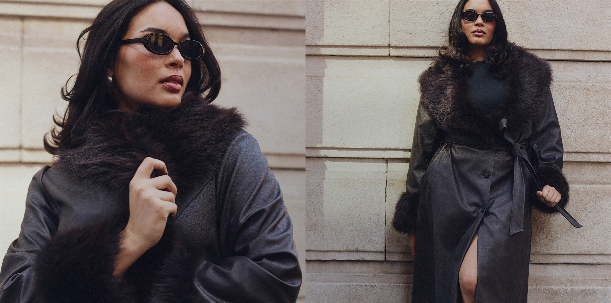 Model wearing back long coat standing next to wall with glasses on