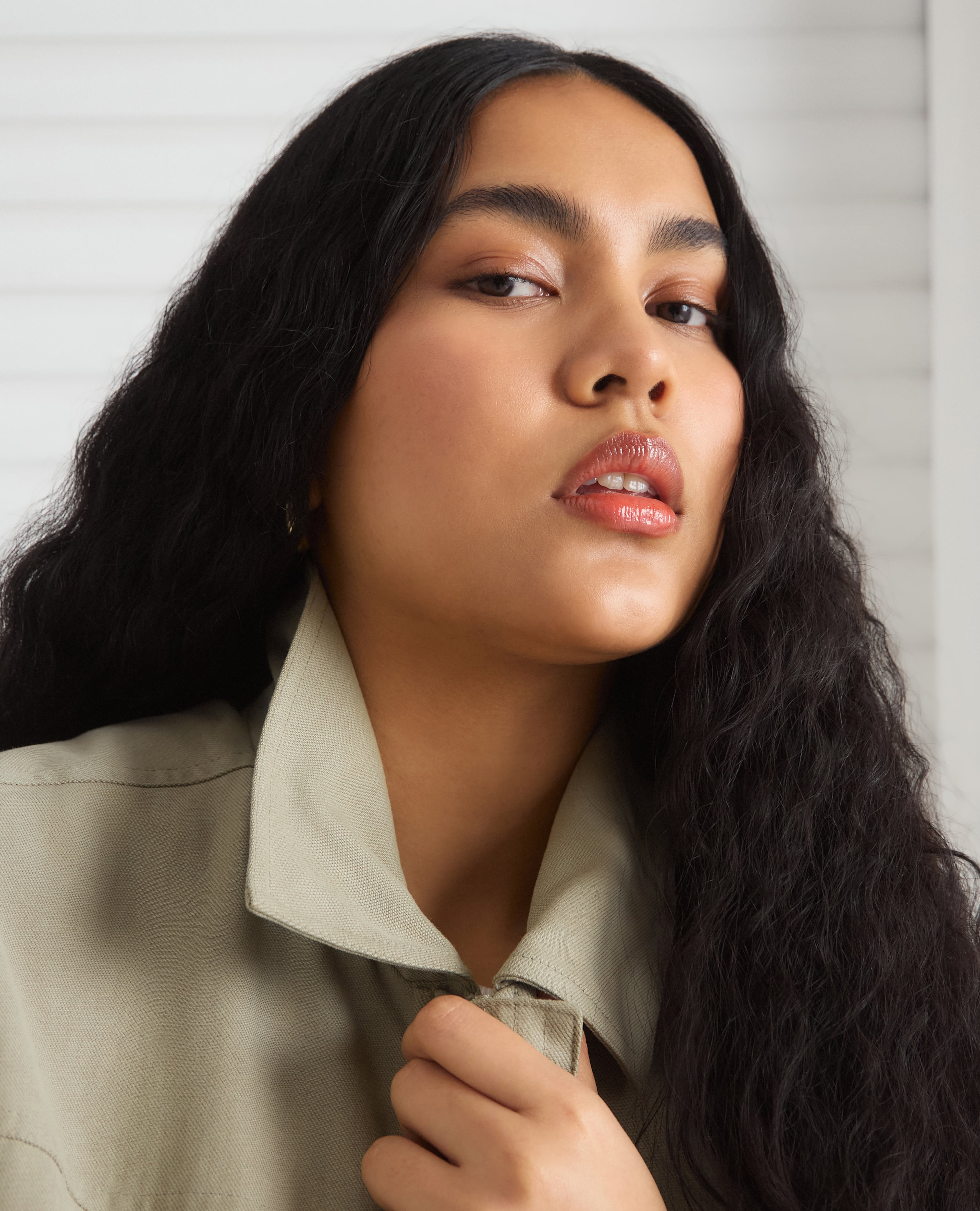Close up model wears Simply Be Sage Cotton Lyocell Short Parka