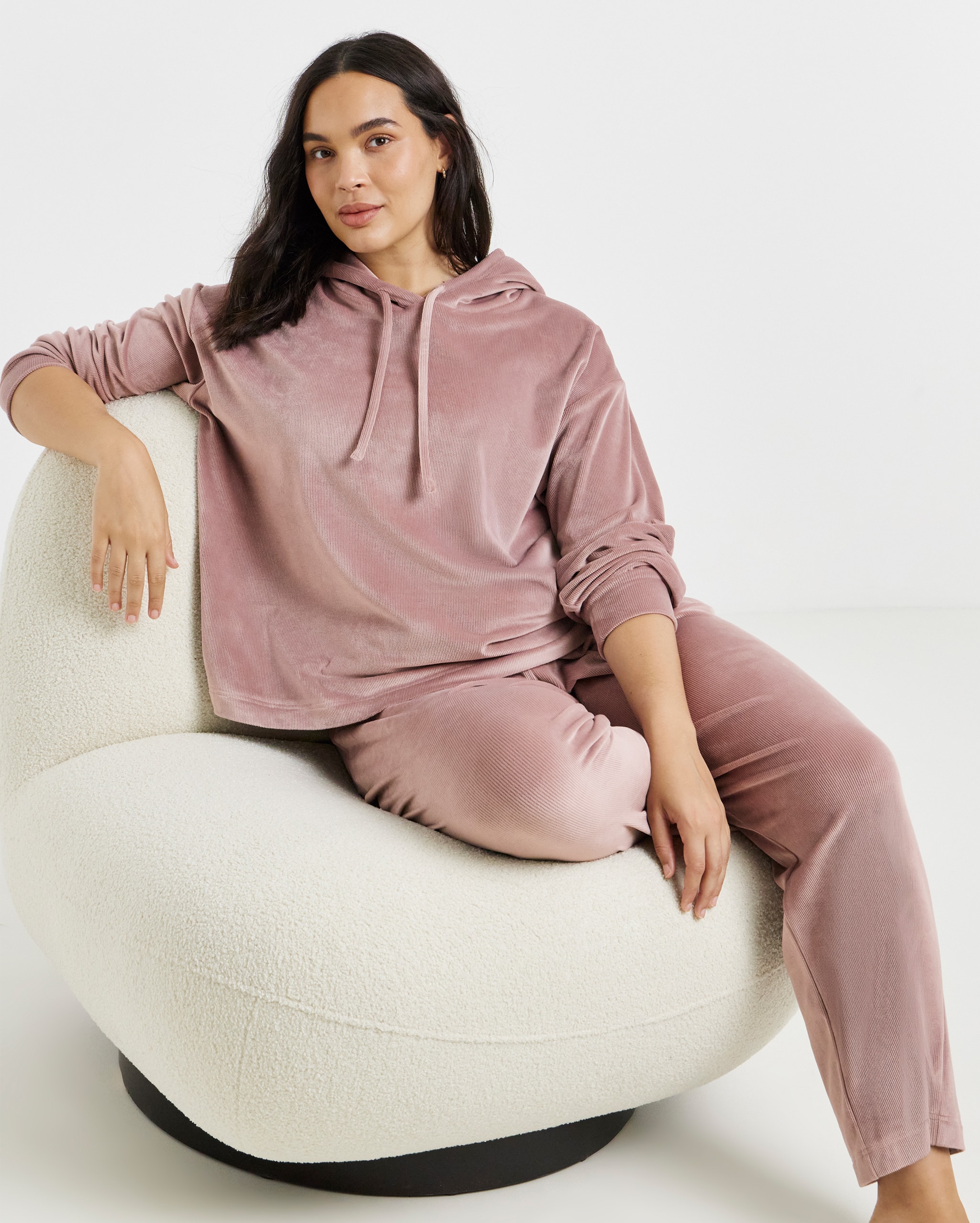Model wears loungwear set in dusky pink