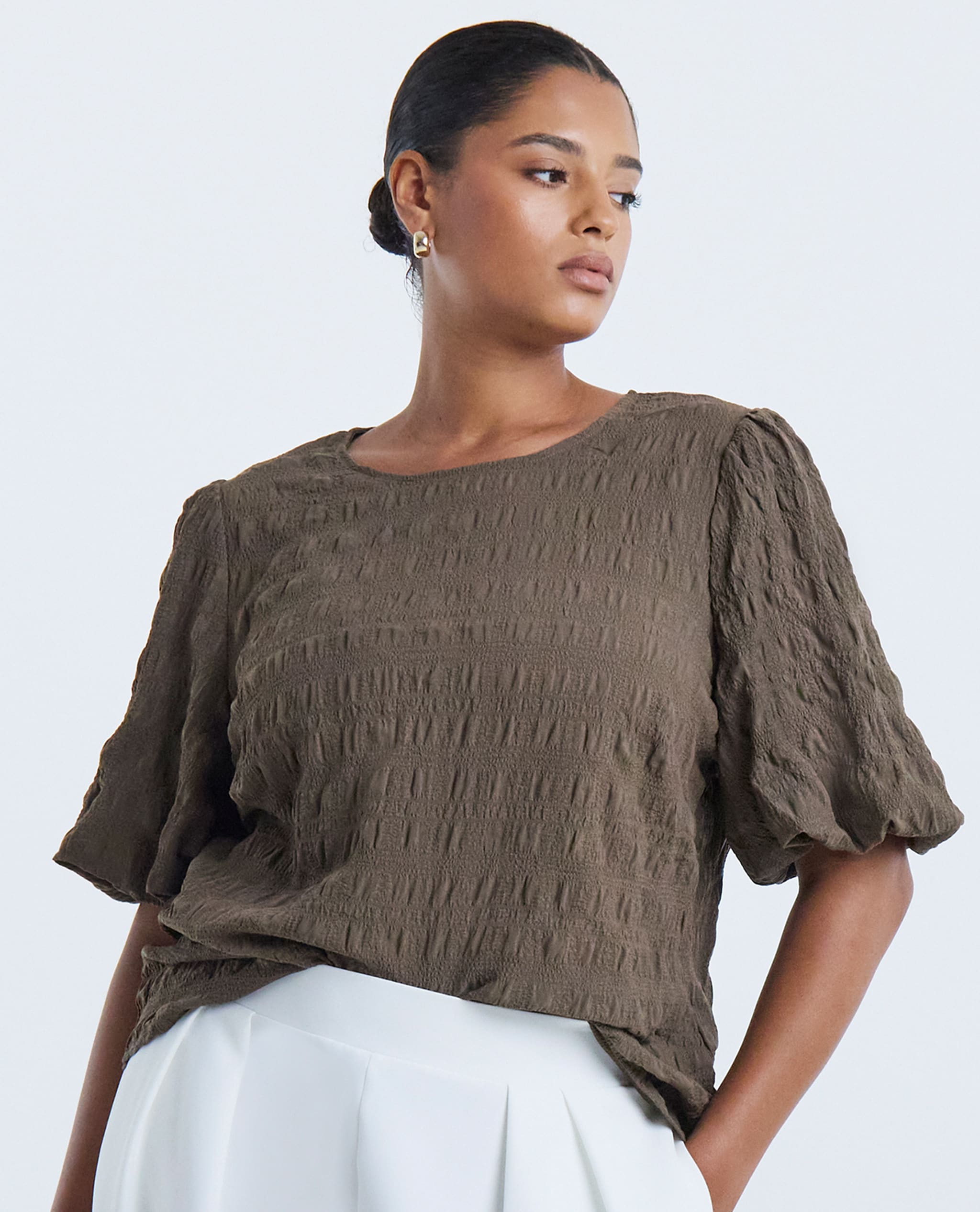 Model wears new season seersucker top in khaki