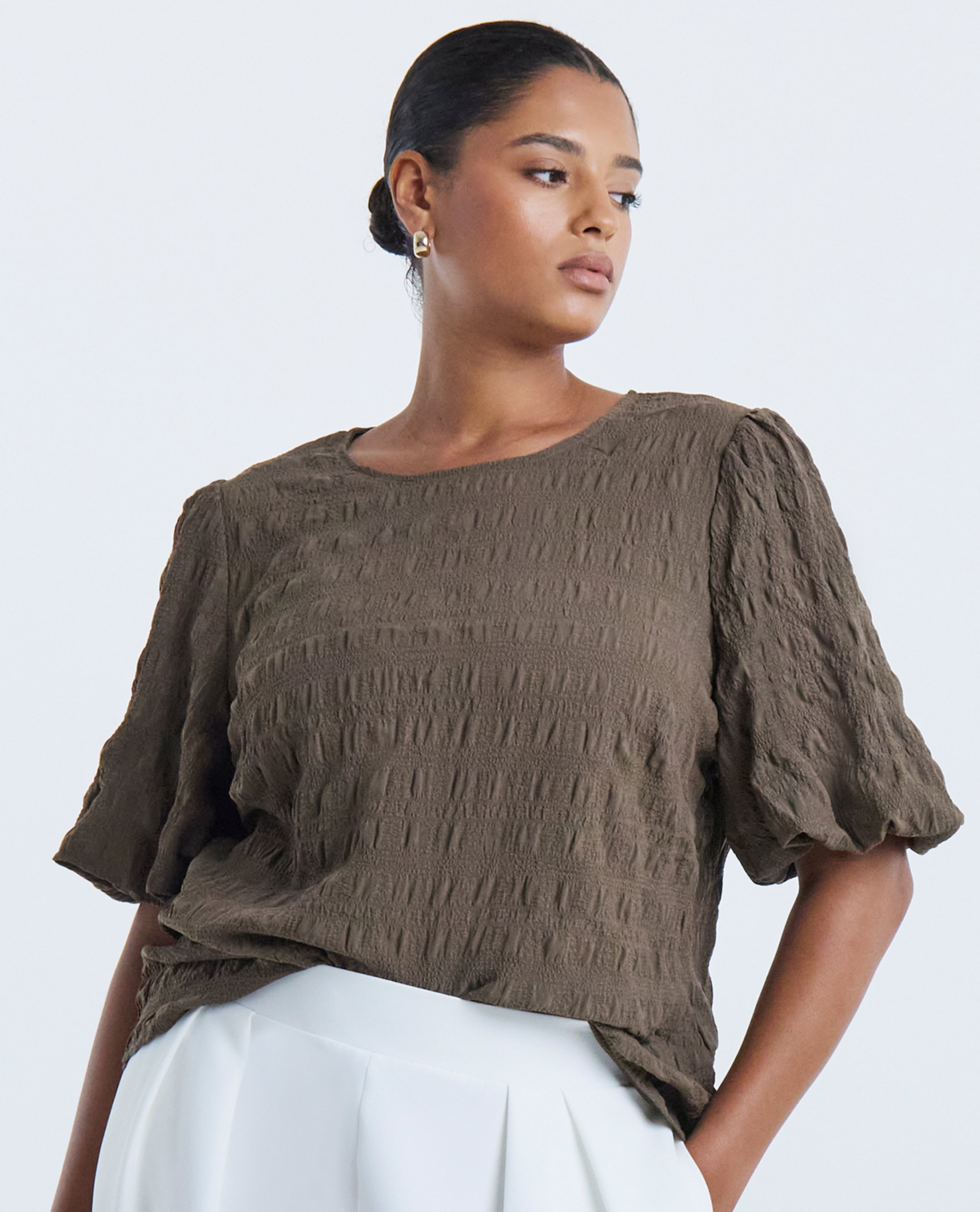 Model wears new season seersucker top in khaki