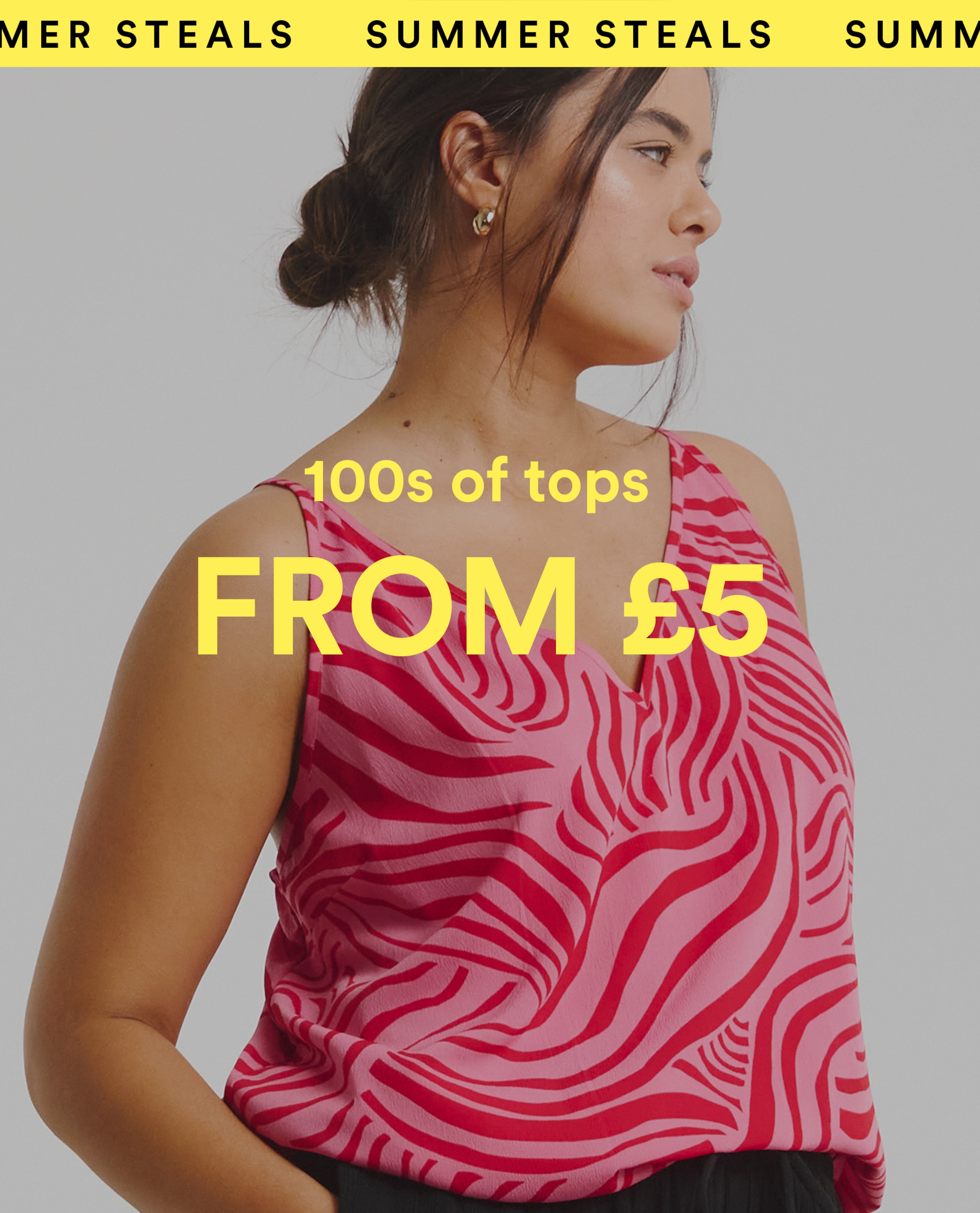 Model wearing a pink patterned sleeveless top
