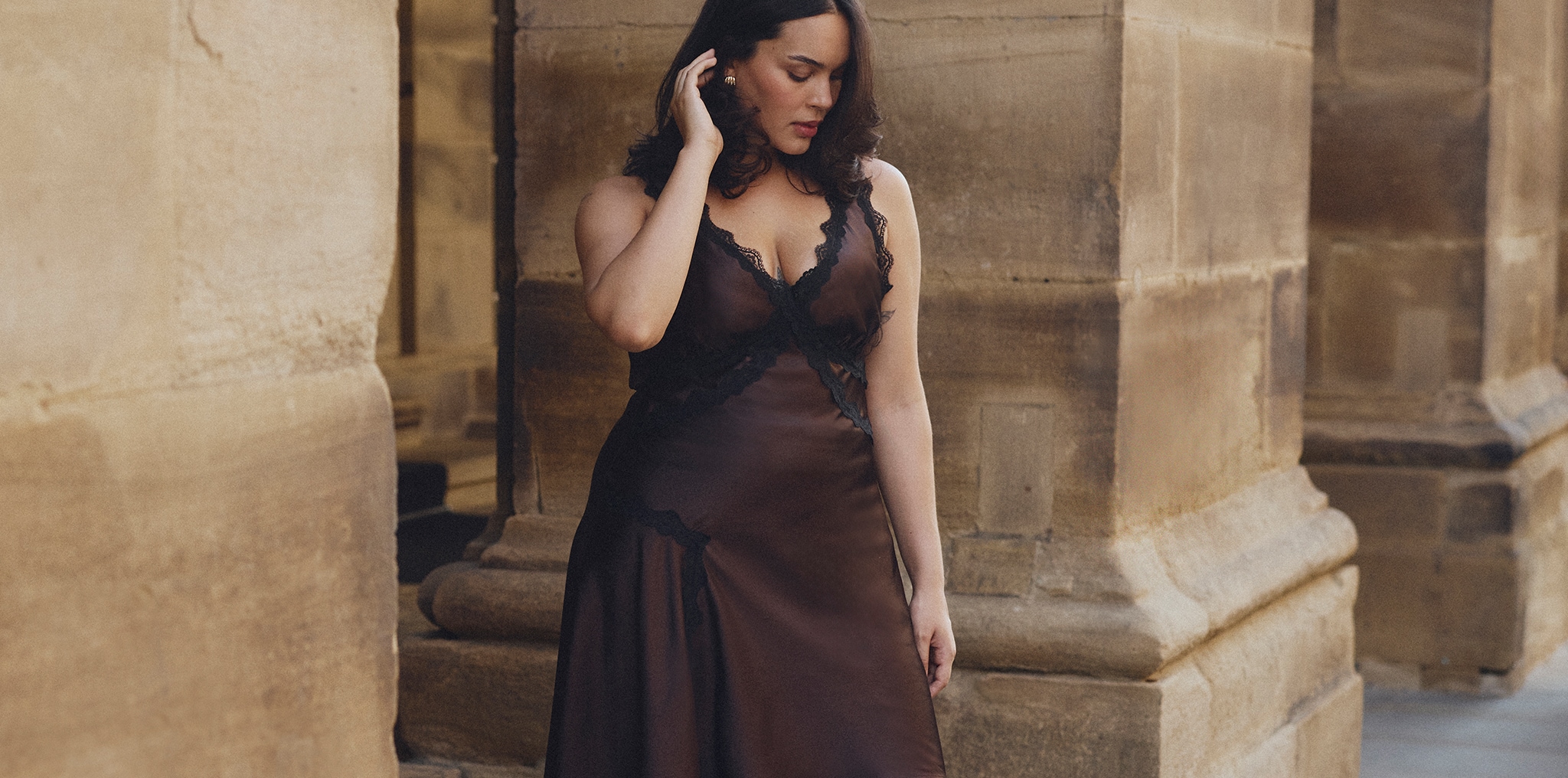 Model wears new season dress in brown