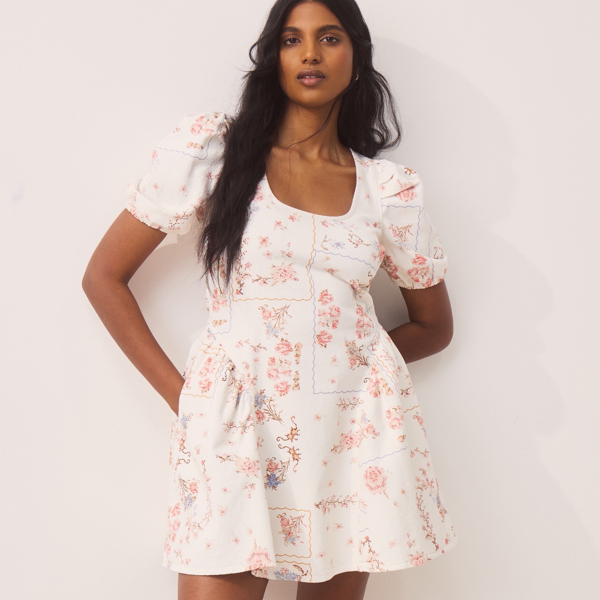 model wearing a flowered dress