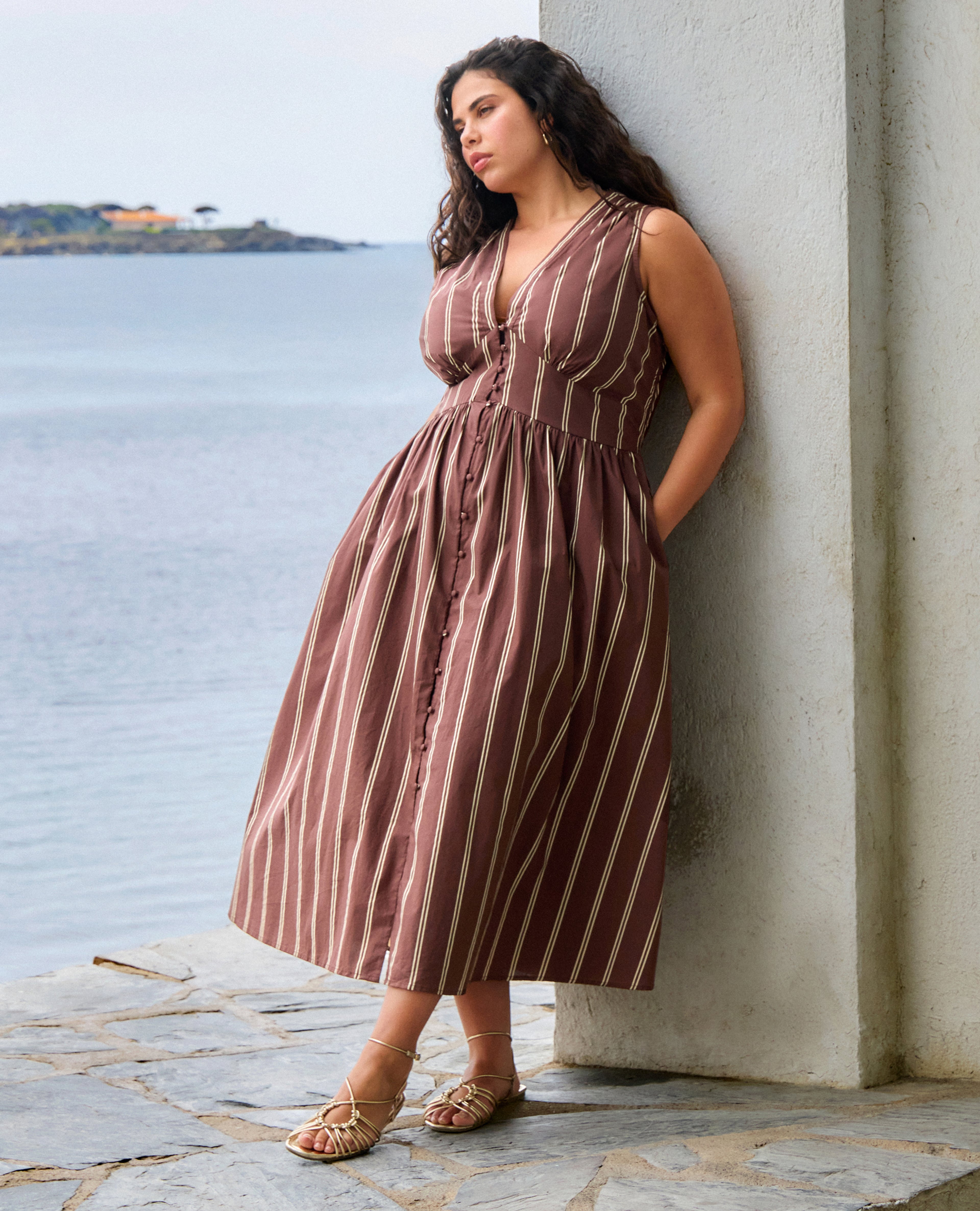 Model wears Nobody's Child SS Starlight Midi Dress