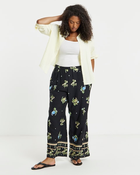 Simply Be Black Floral Border Print Wide Leg Trousers