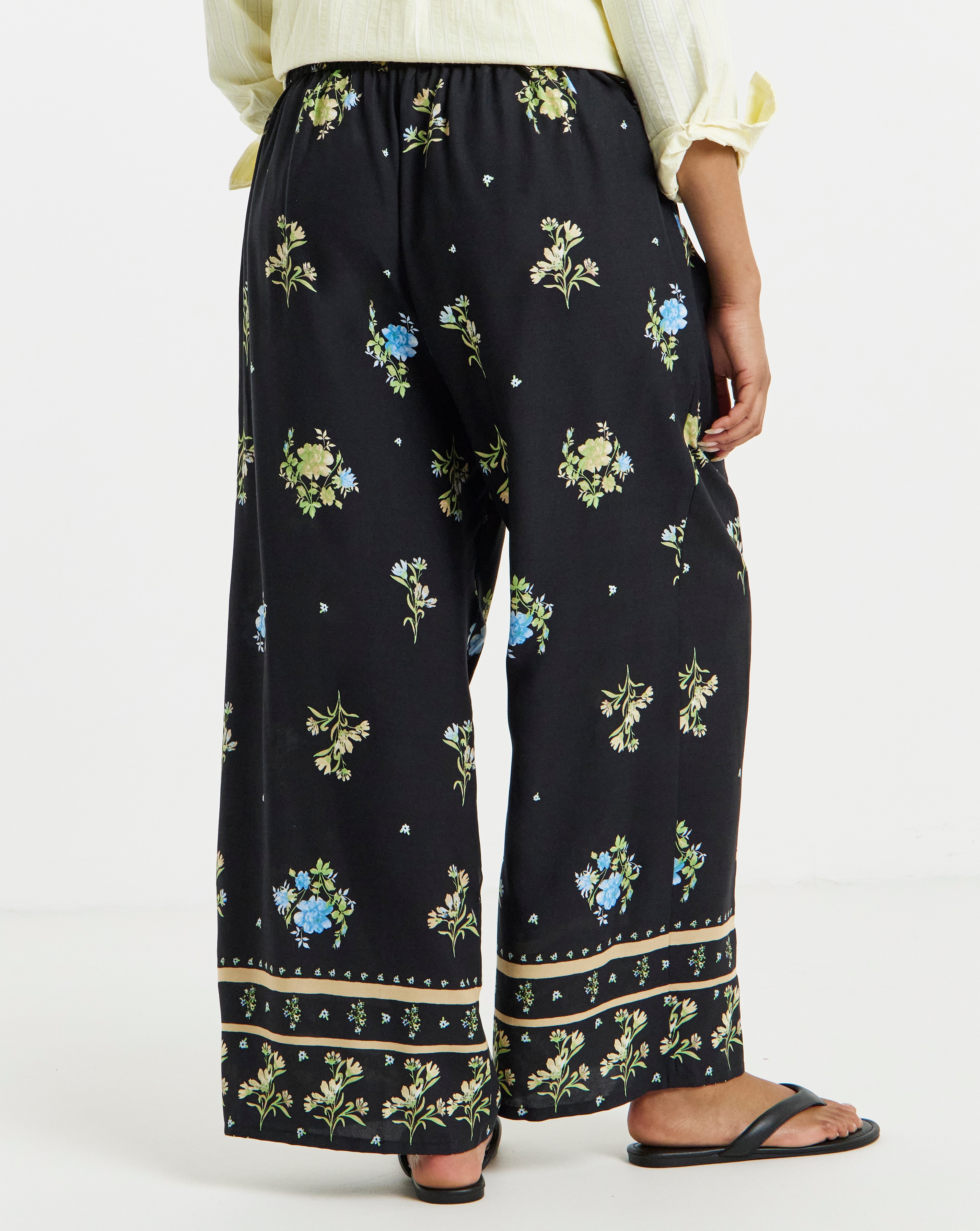 Simply Be Black Floral Border Print Wide Leg Trousers | Simply Be