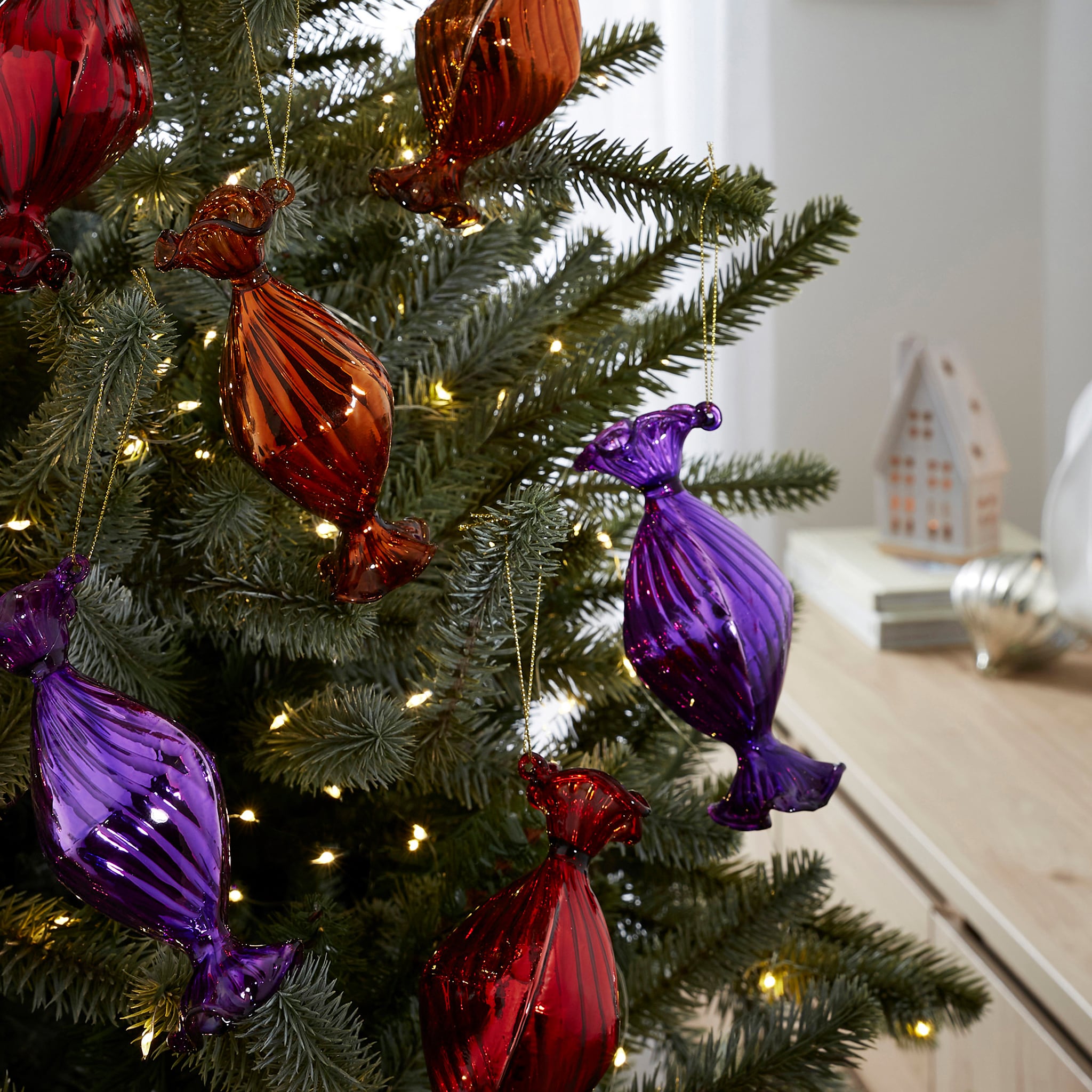 Set of 6 Glass Sweet Baubles are pictured on a Christmas tree