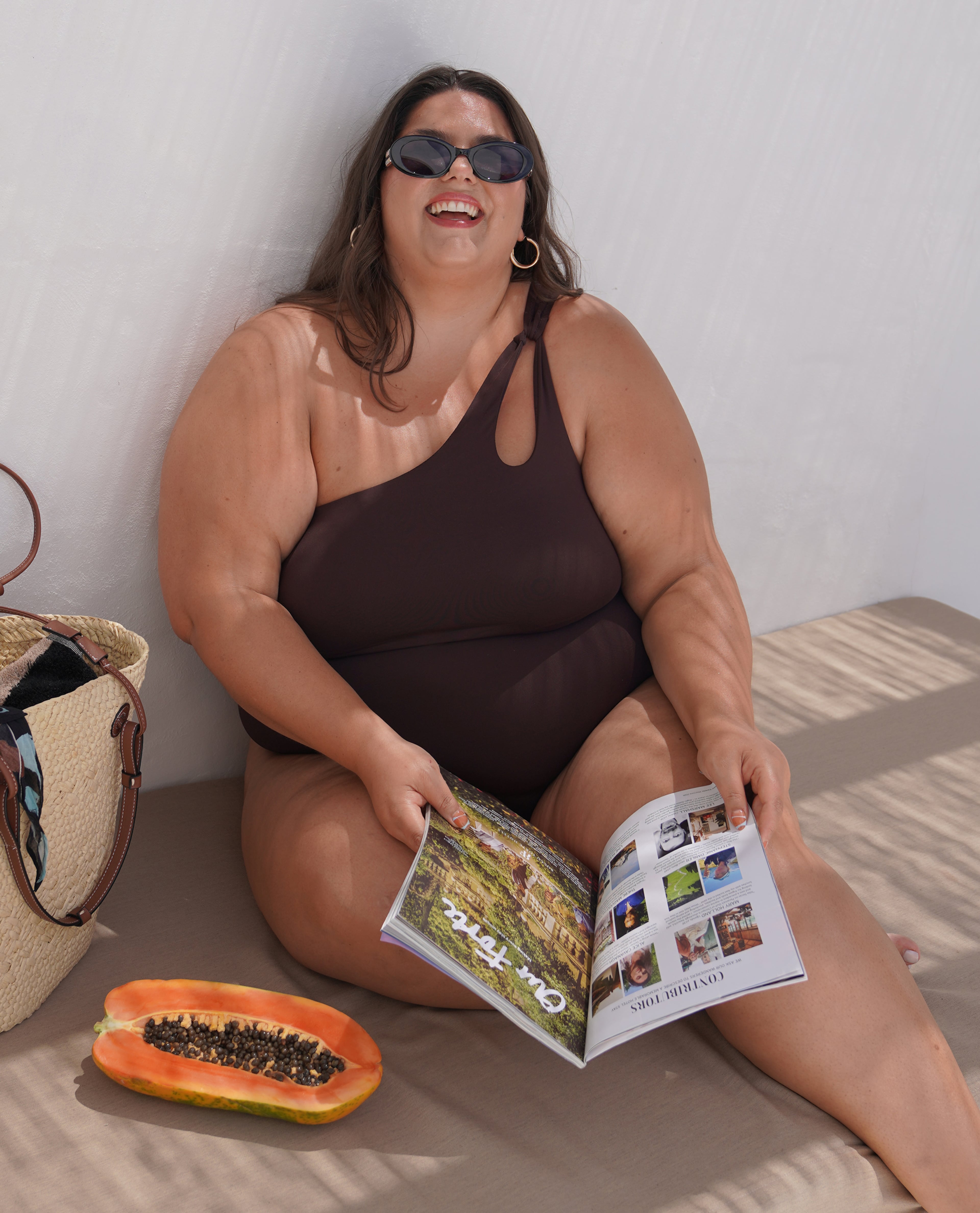 Calle Thorpe Influencer wears Monsoon Brown Swimsuit