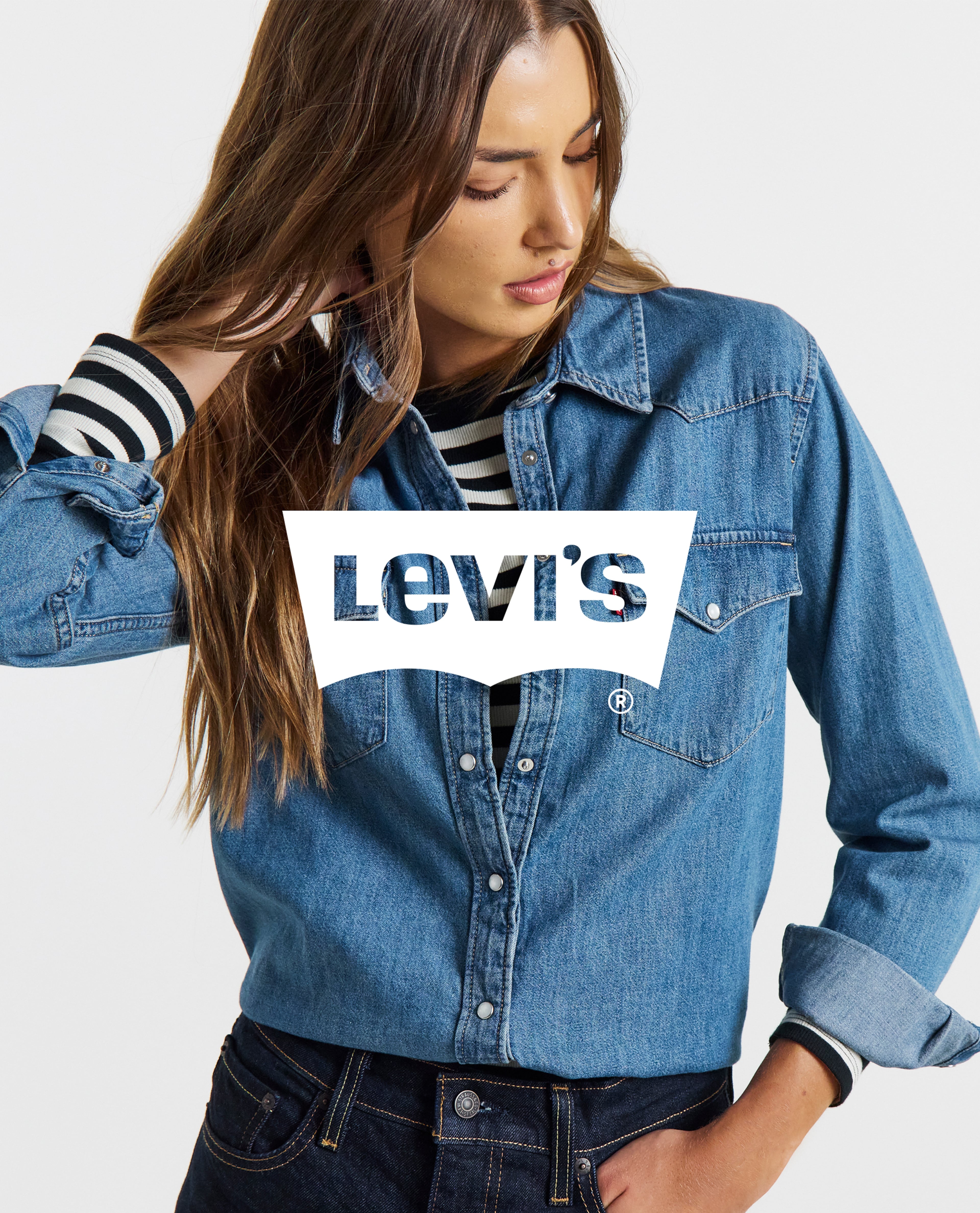 Model wears denim shirt from Levis