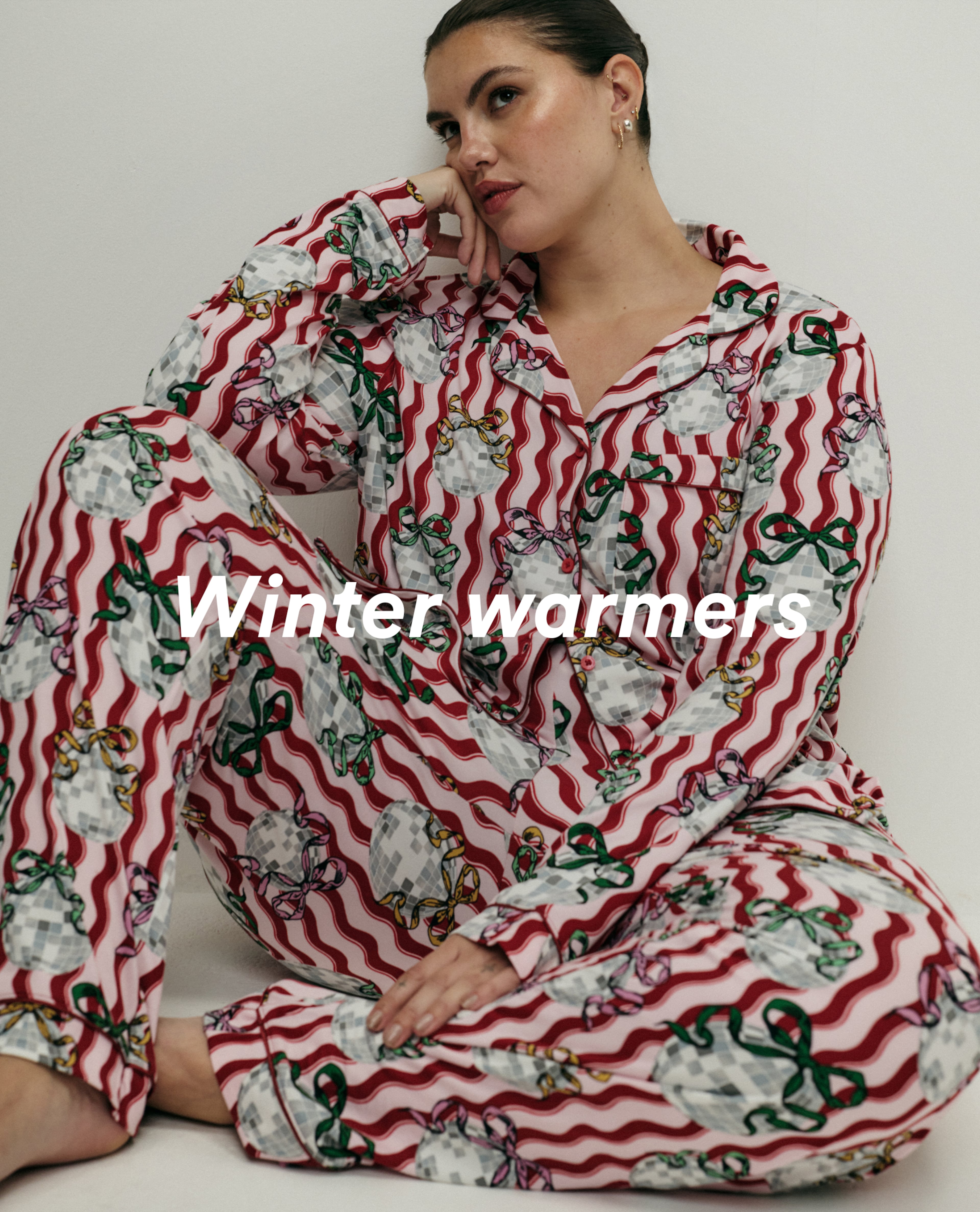 Model wears festive nightwear set