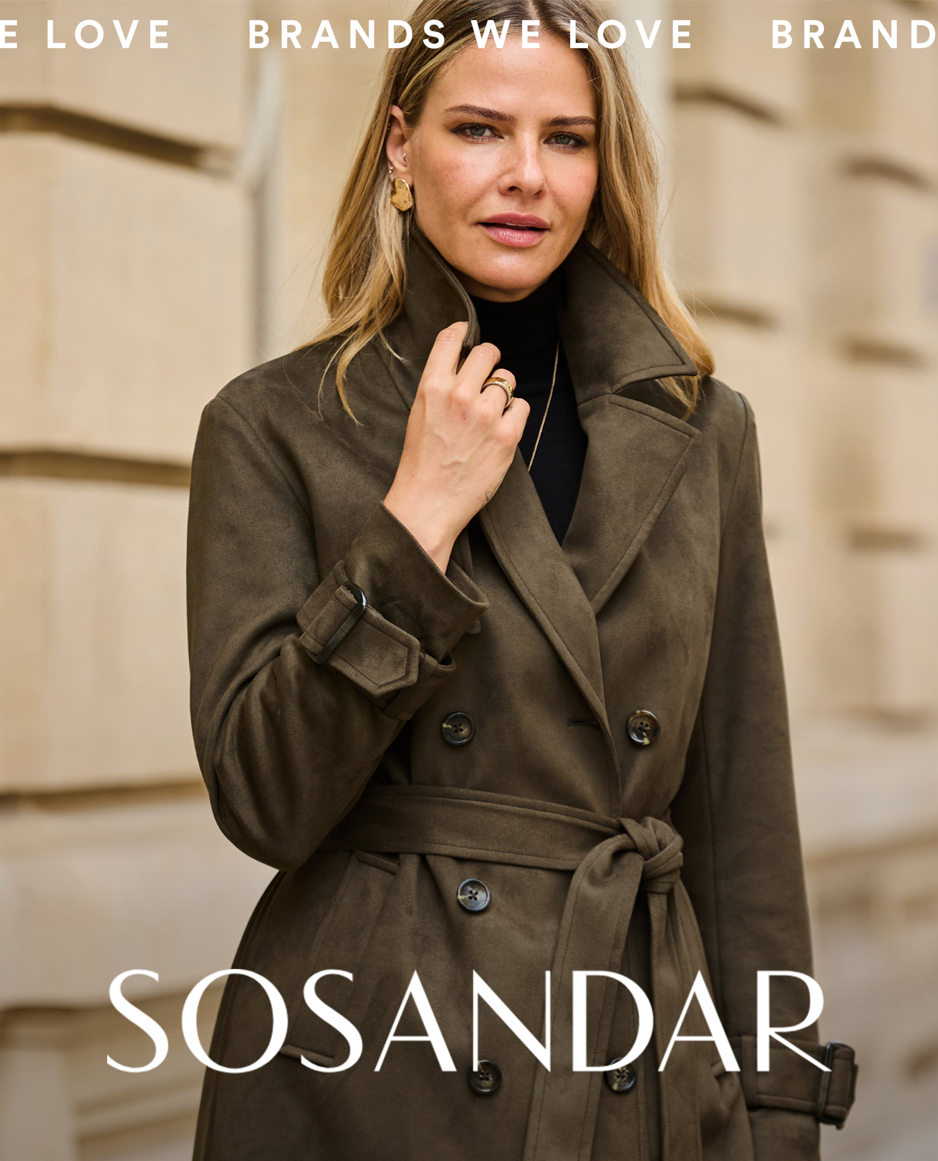 Model wears coat by Sosandar