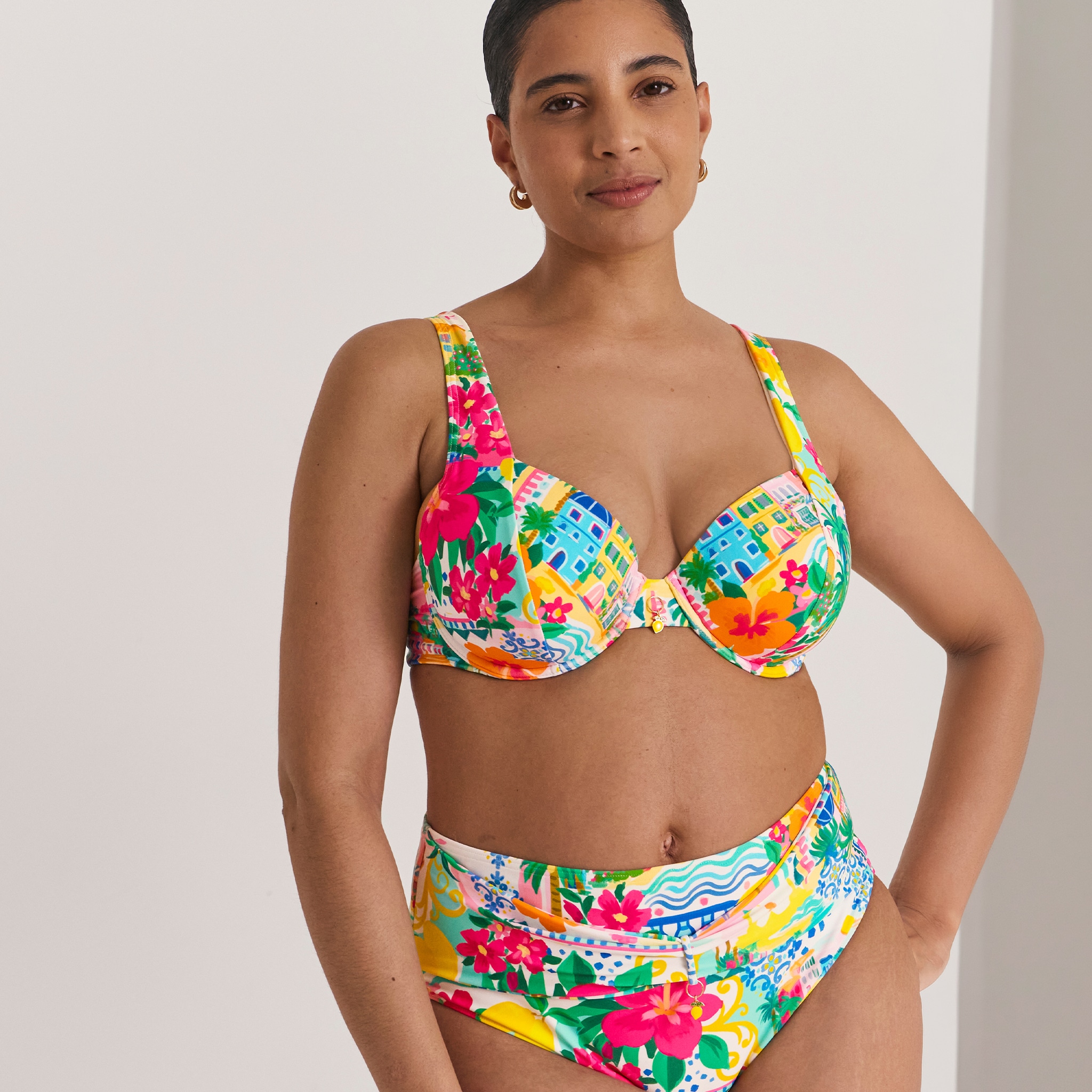 model wearing multi colour Bikinis