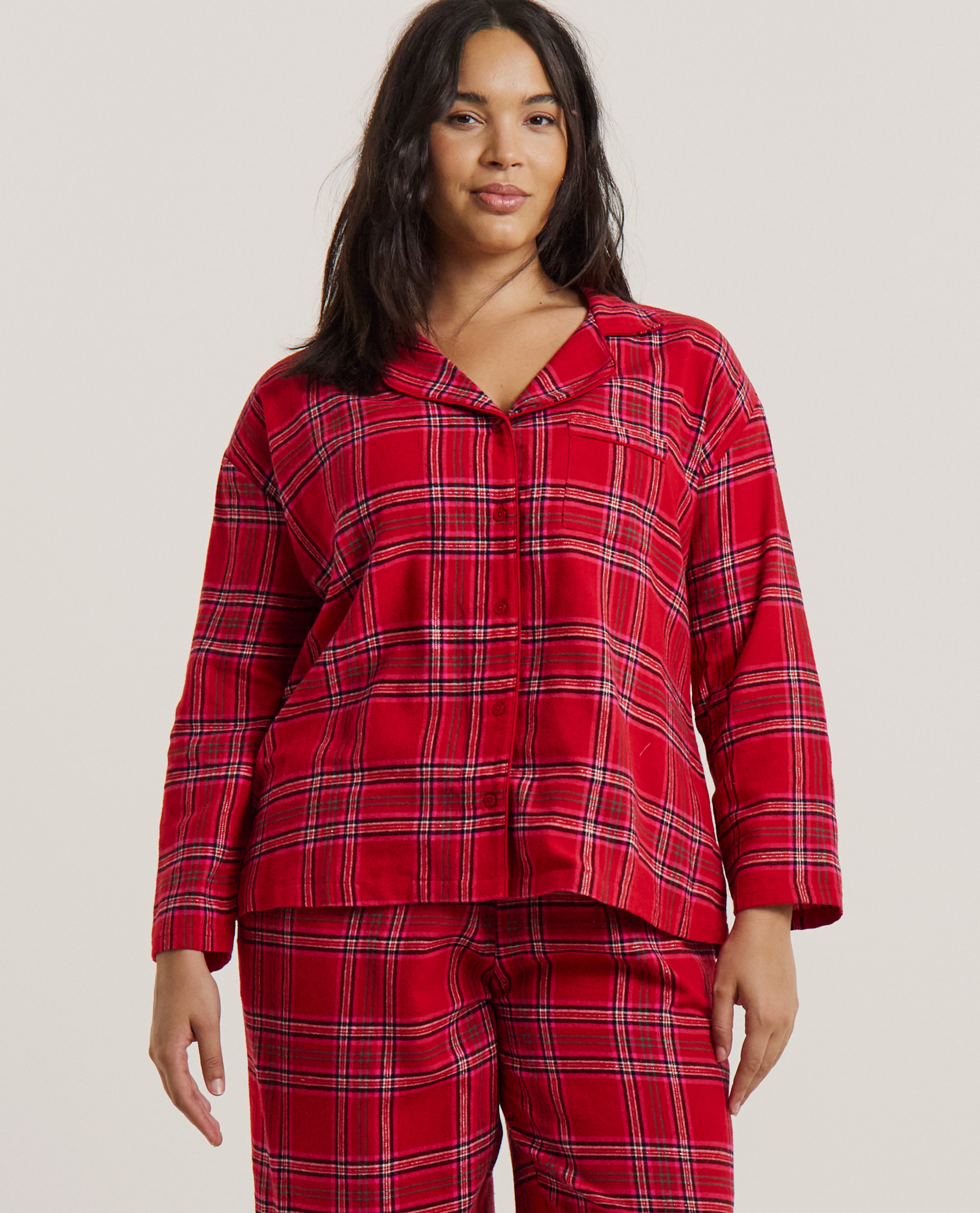 Model wears red tartan pyjama set