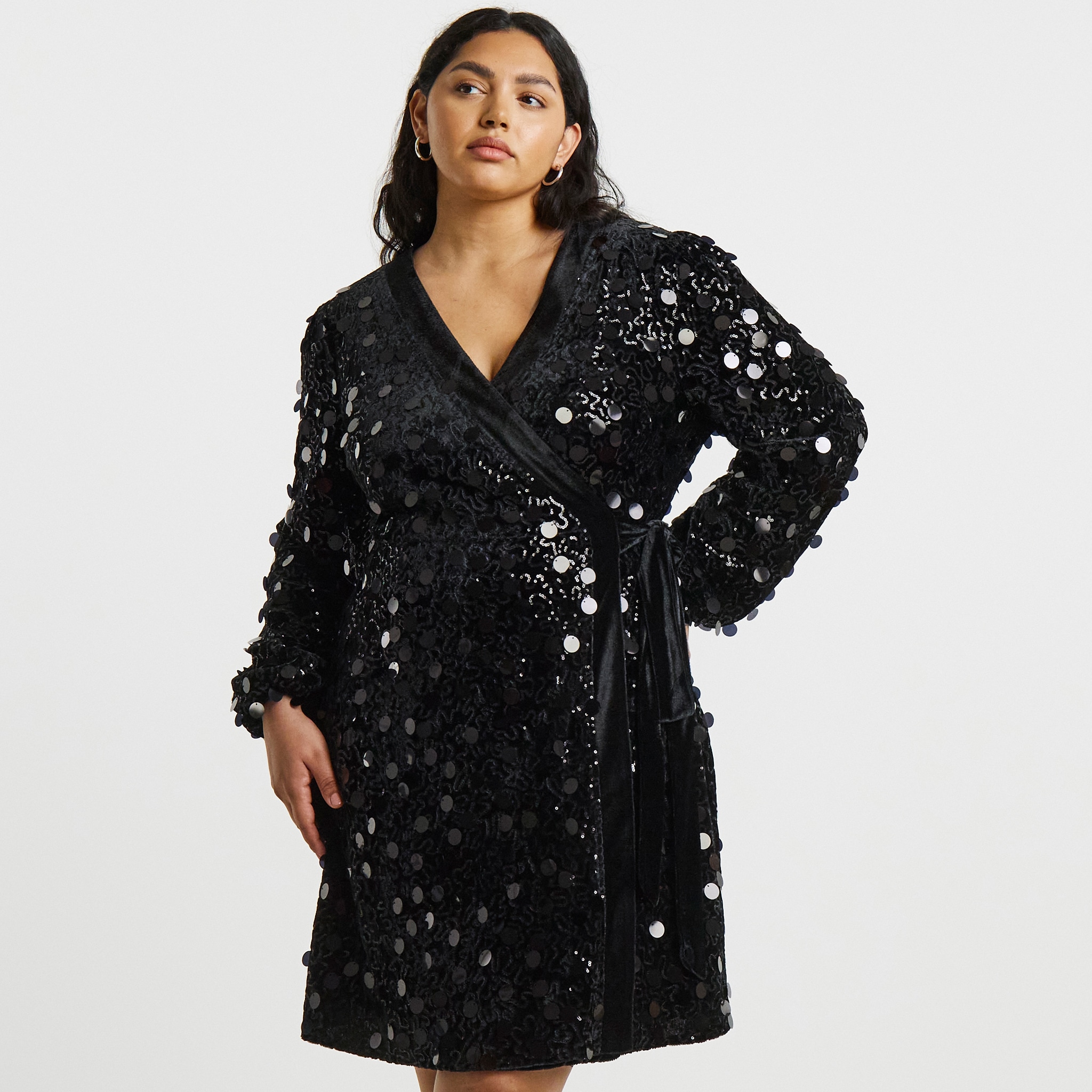model wearing black sequence dress
