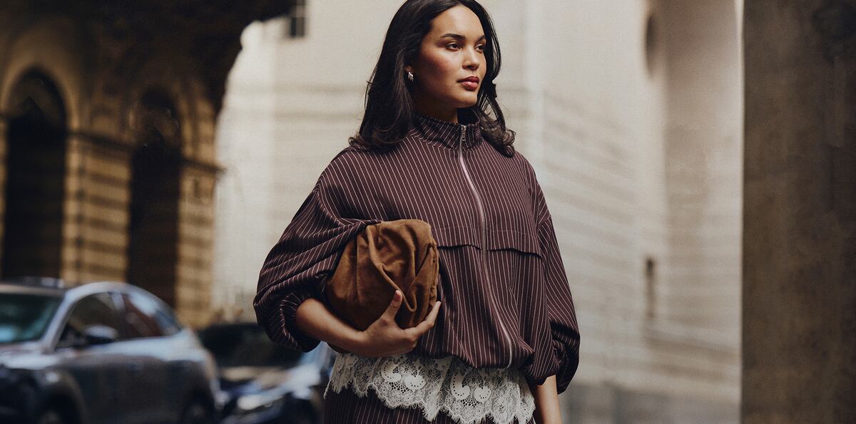 Model wears new season pin-stripe jacket 