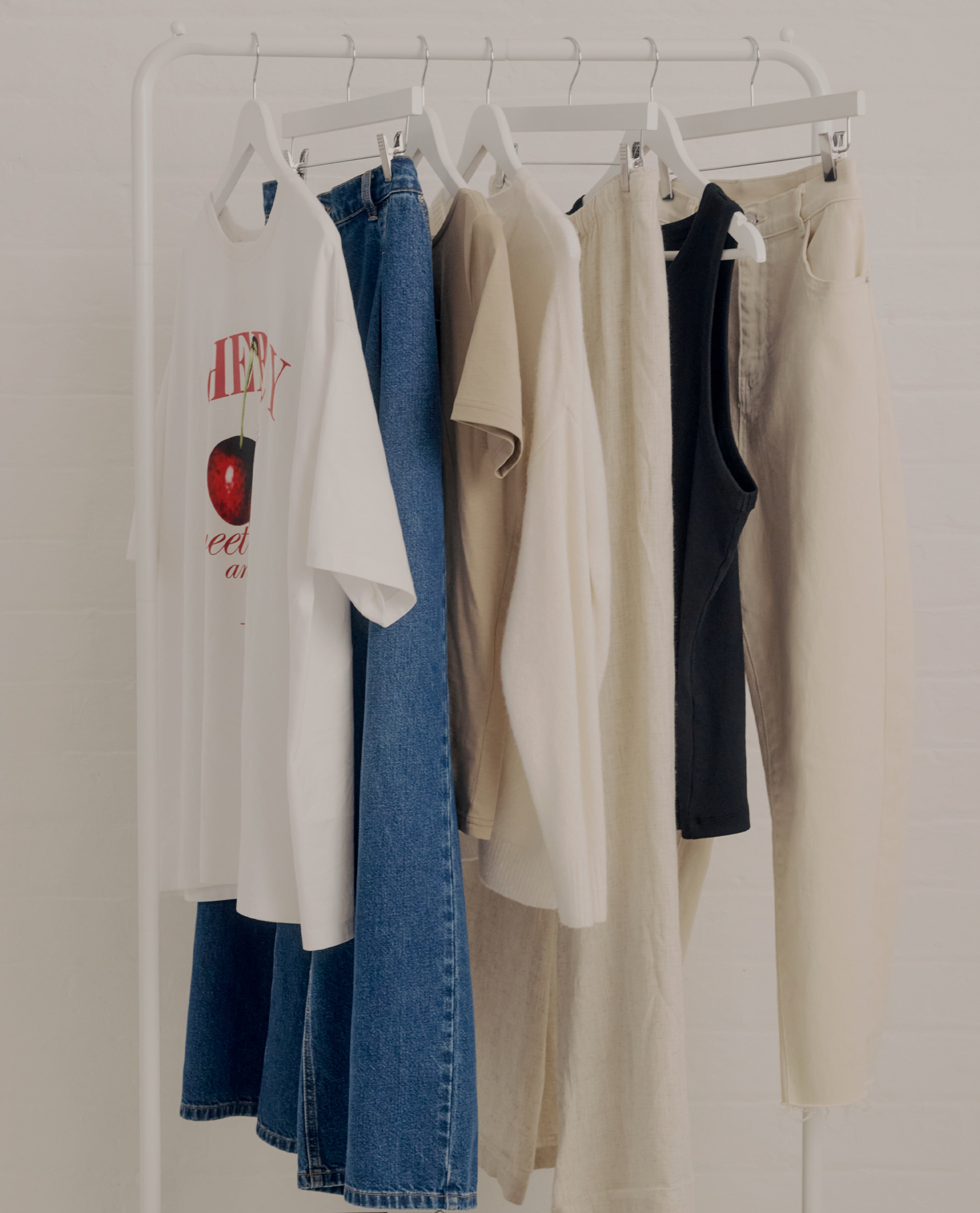 Clothes hanging on rail