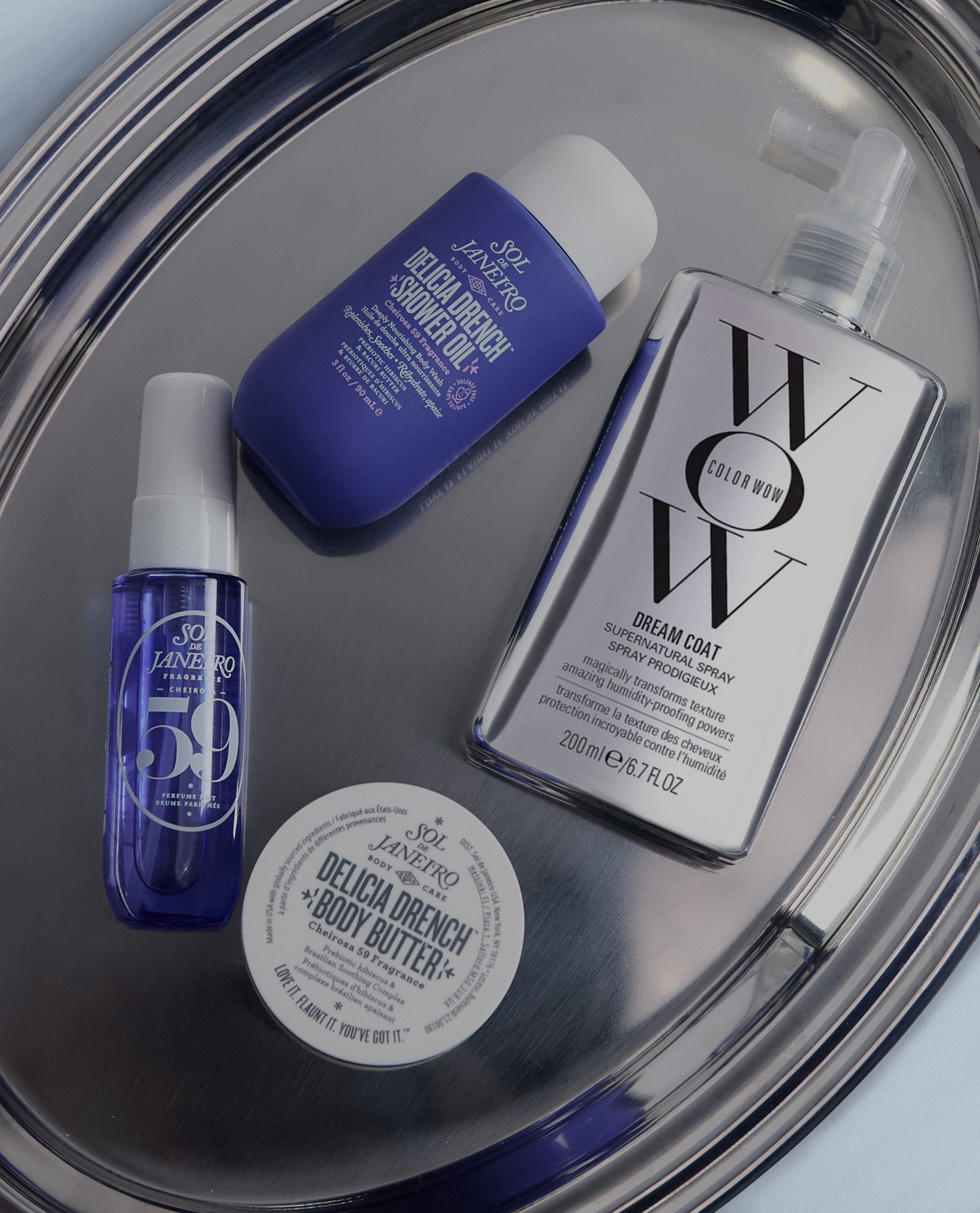 Various beauty products on silver tray