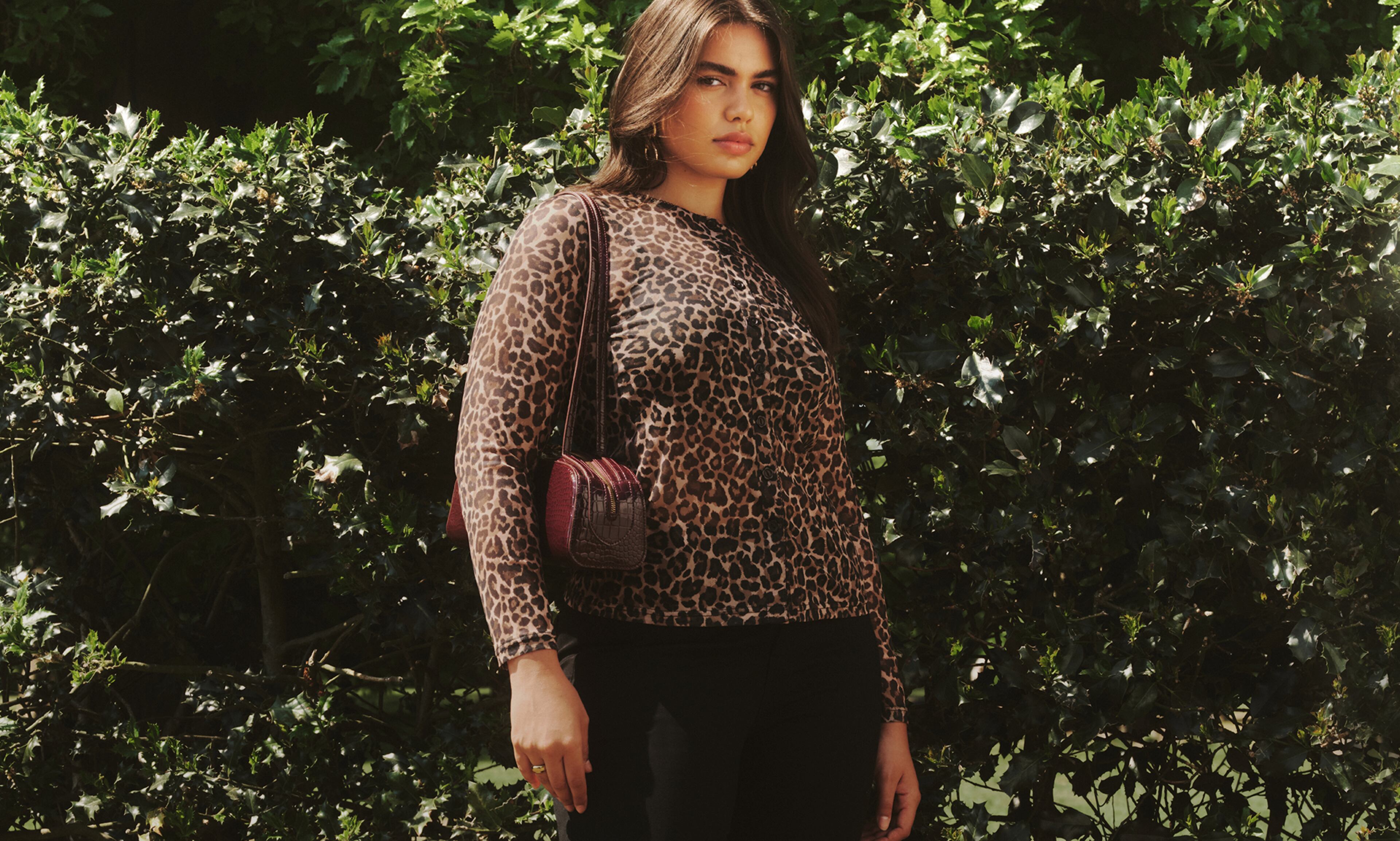 Model wears leopard print top