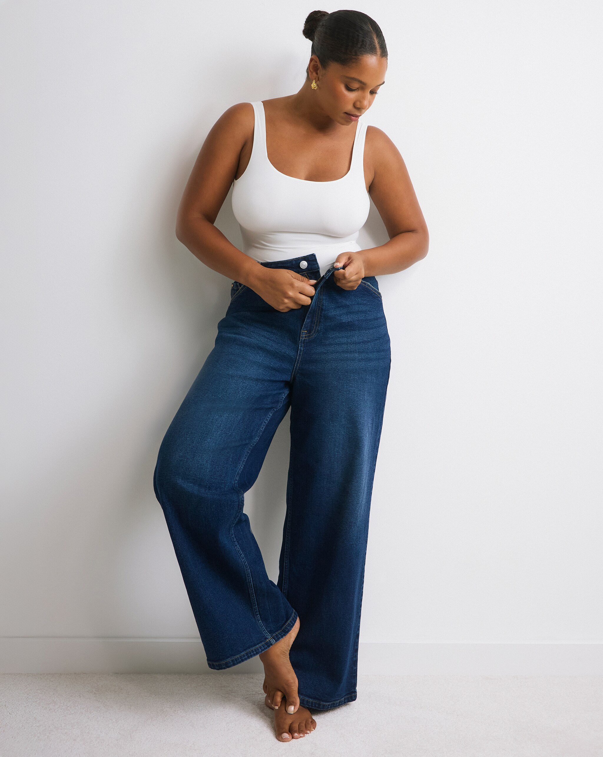 Buttoning up jeans