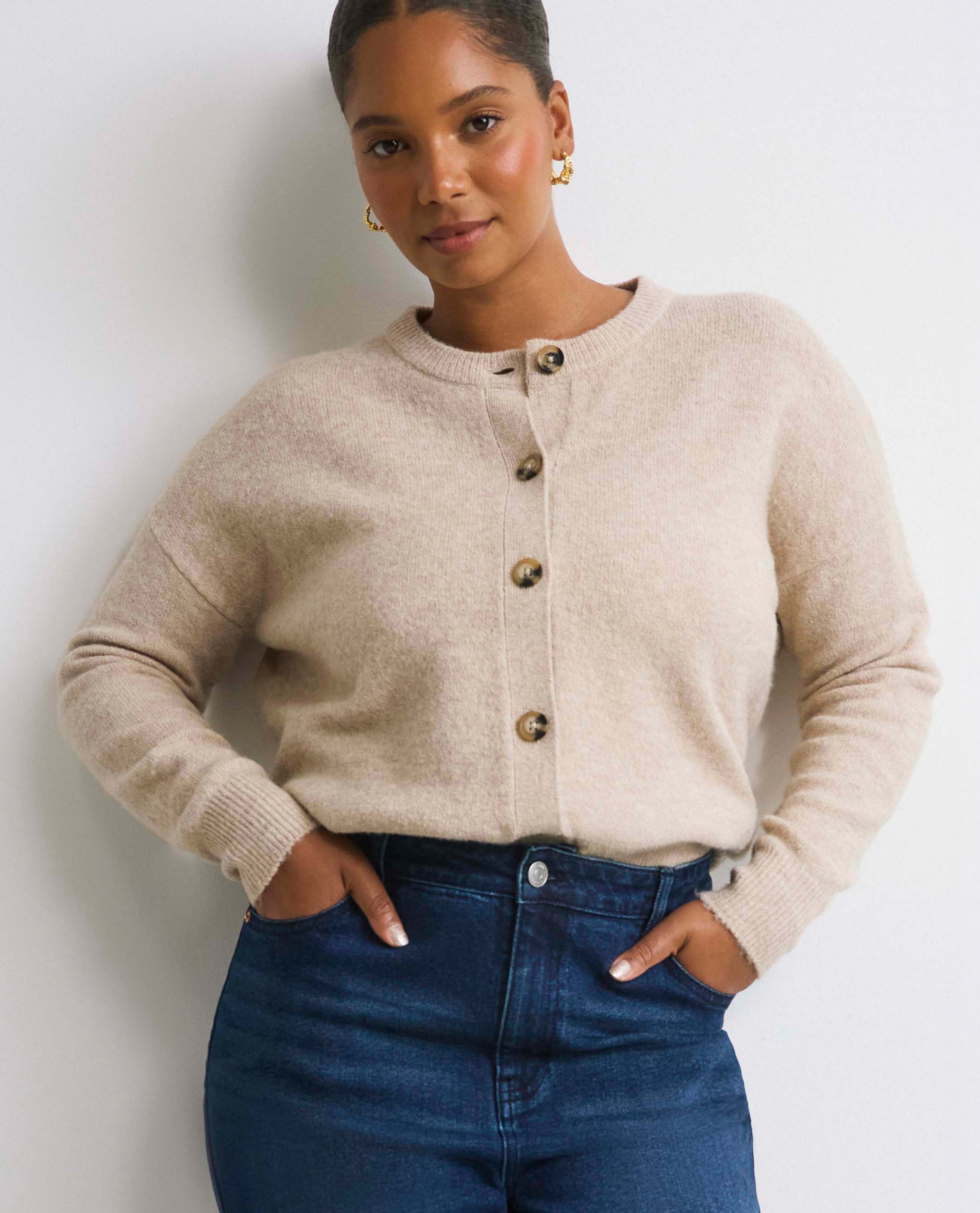 Model wears Cream cardigan with 99 1 Indigo Comfort Stretch Relaxed Straight Leg Jeans