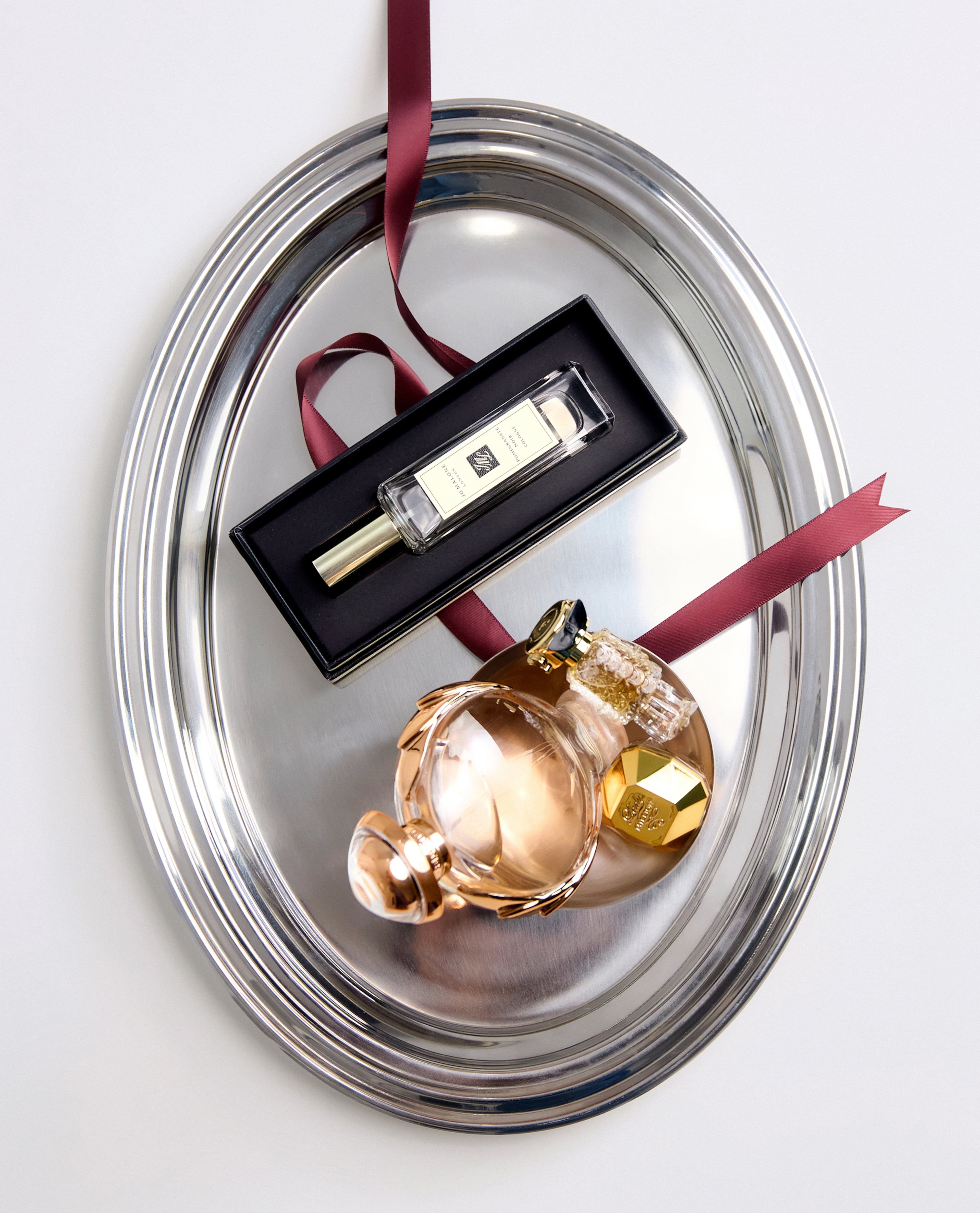 Fragrance bottles on silver tray
