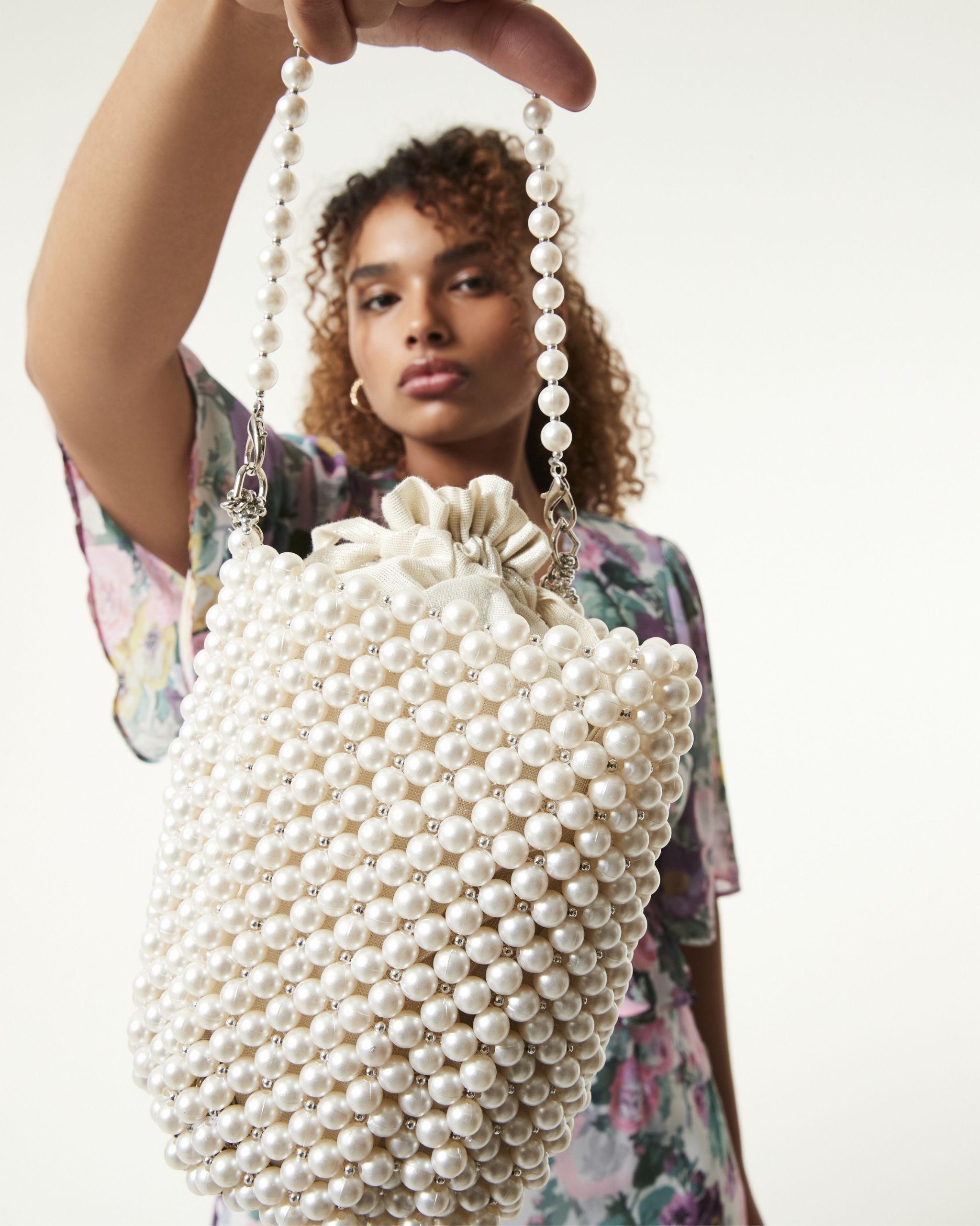A white pearly handbag
