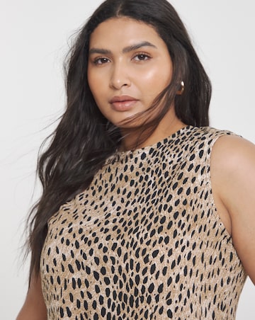 Animal Print Waffle Peplum Top