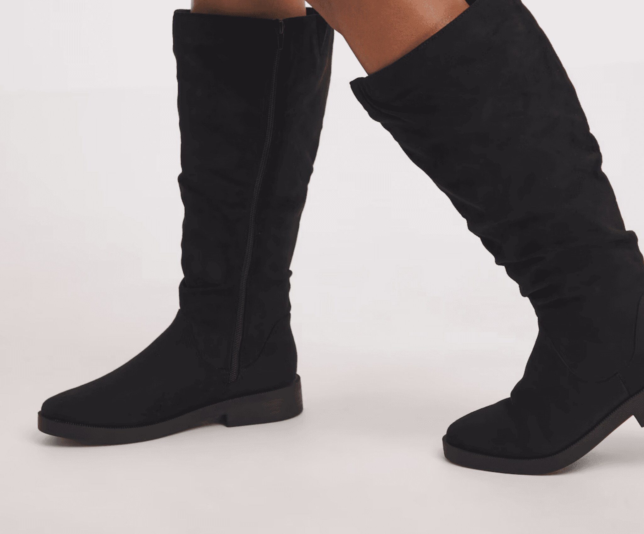 Calf length black suede boots