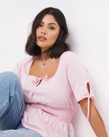Tie Front Shirred Waist Peplum Top