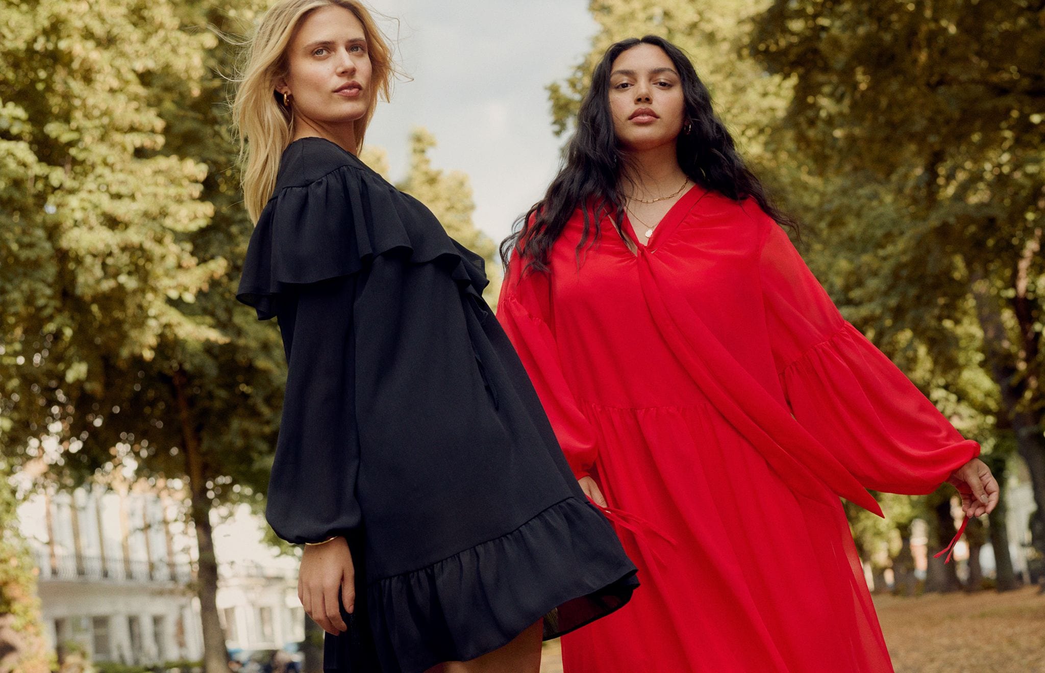 Models wearing Red Tiered Georgette Maxi Dress and Black Short Tiered dress