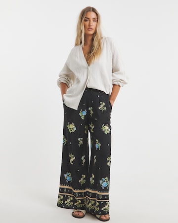 Simply Be Black Floral Border Print Wide Leg Trousers