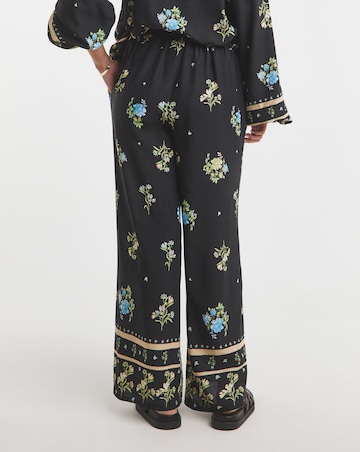 Simply Be Black Floral Border Print Wide Leg Trousers
