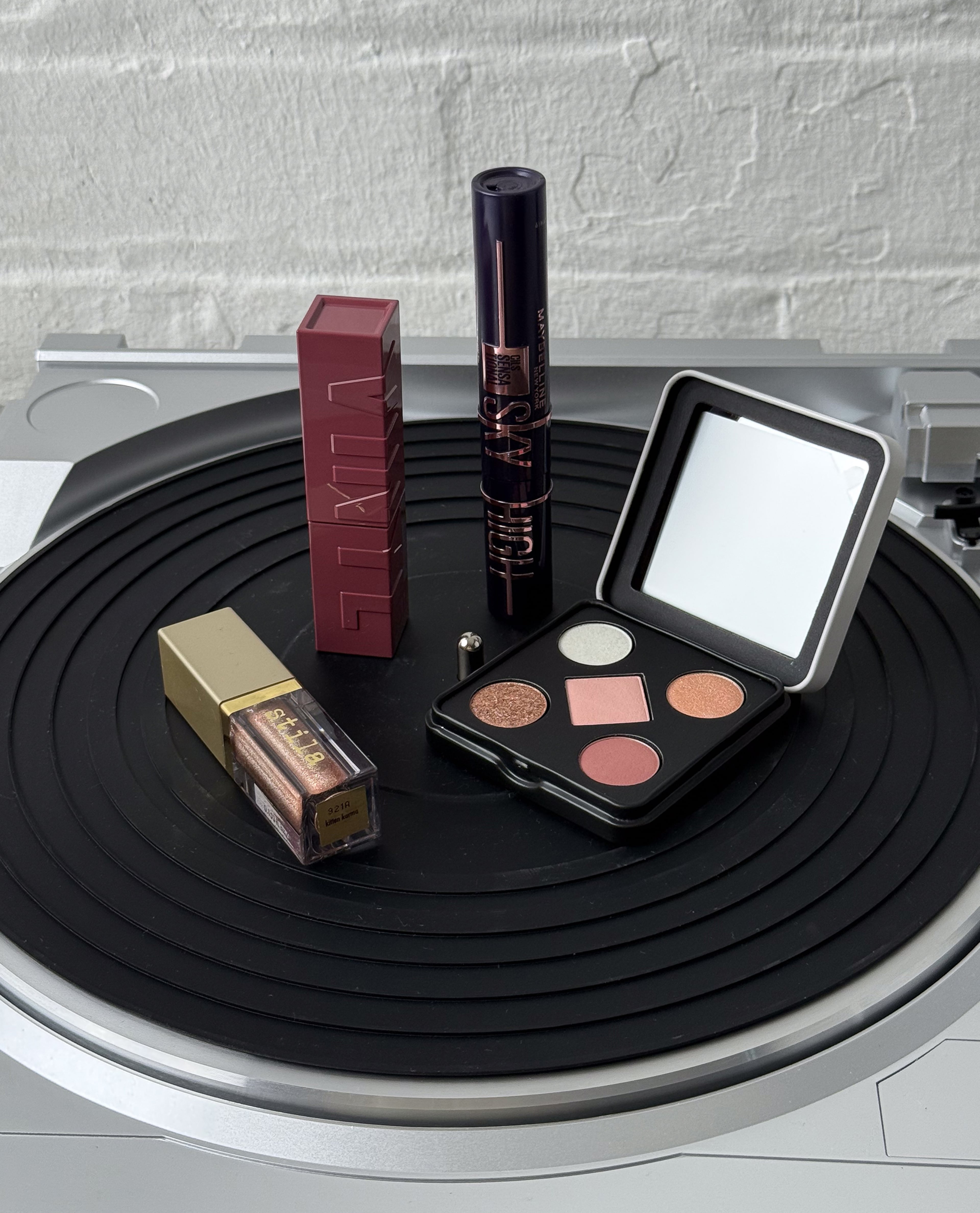 Beauty products sat on a turntable