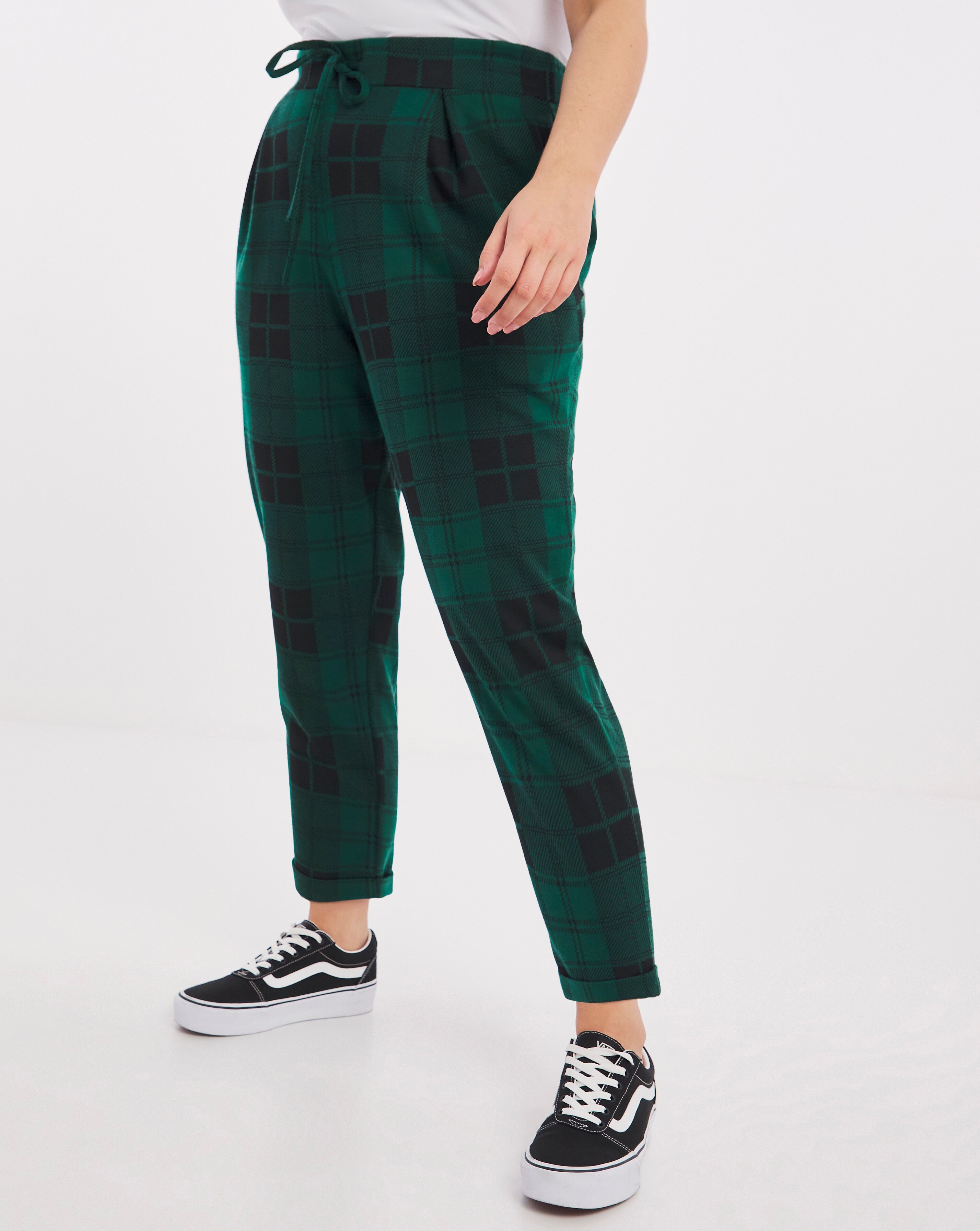 Green and black check trousers sales