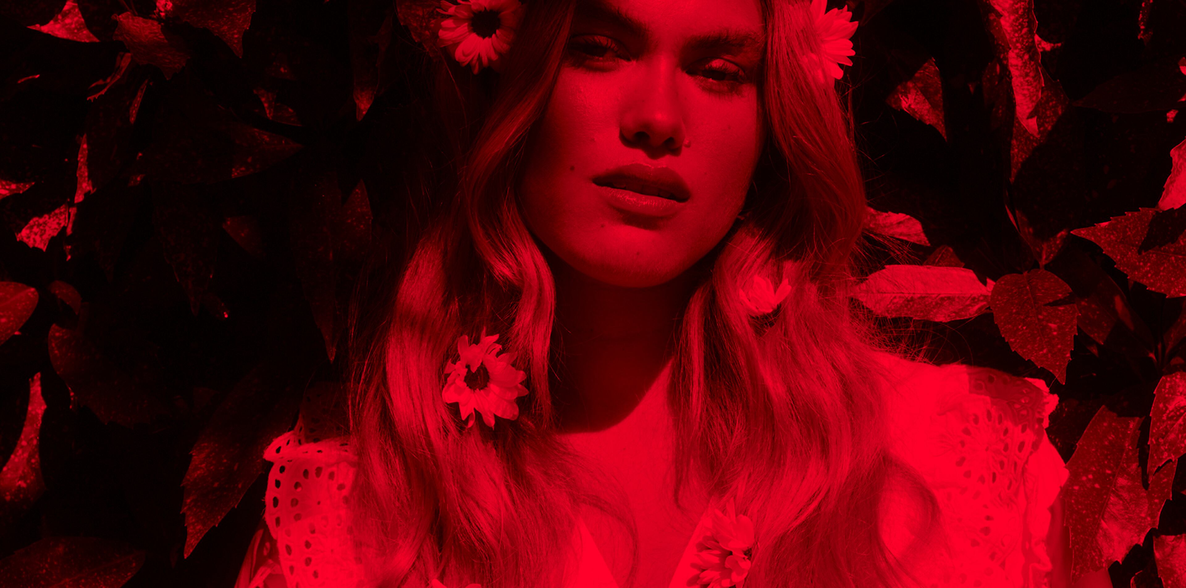 Model with with string of flowers