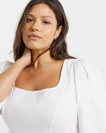White Stretch Fit and Flare Peplum Top