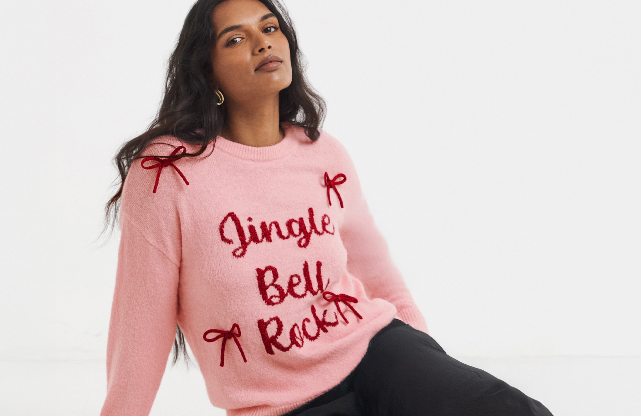 Model Wearing Pink Jingle Bell Rock Christmas Jumper