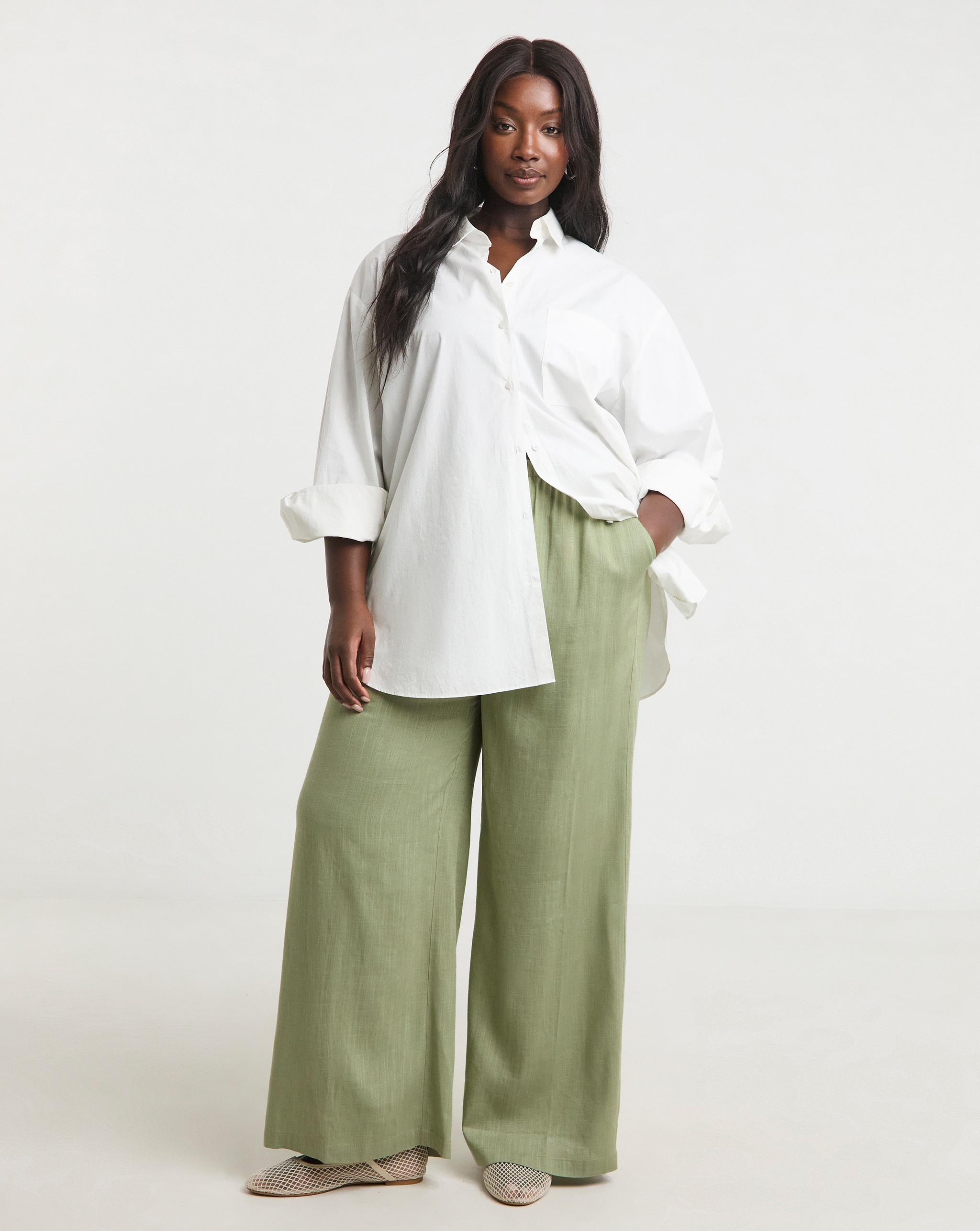 Pale khaki linen trousers with white casual shirt