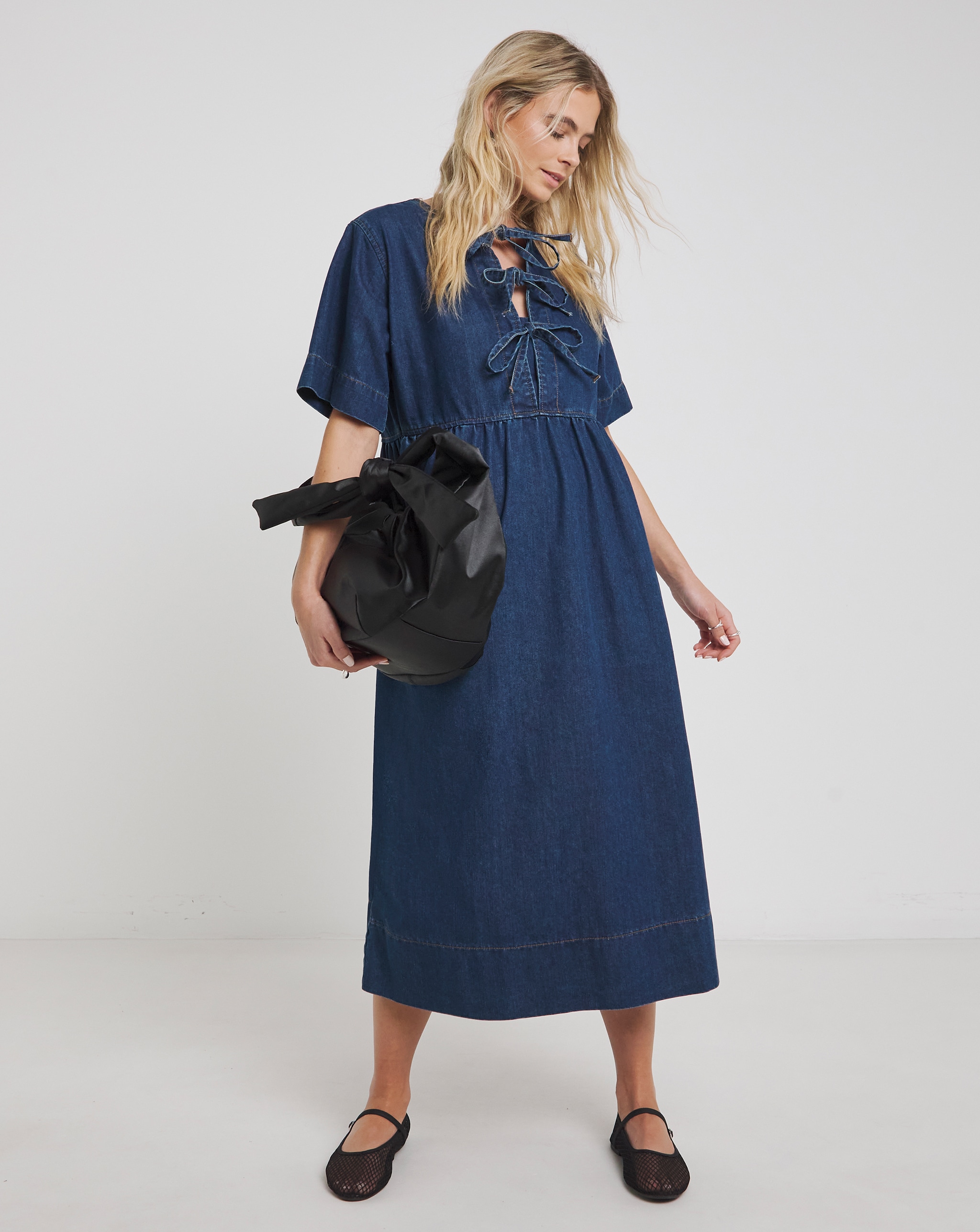 Denim dress with bow details