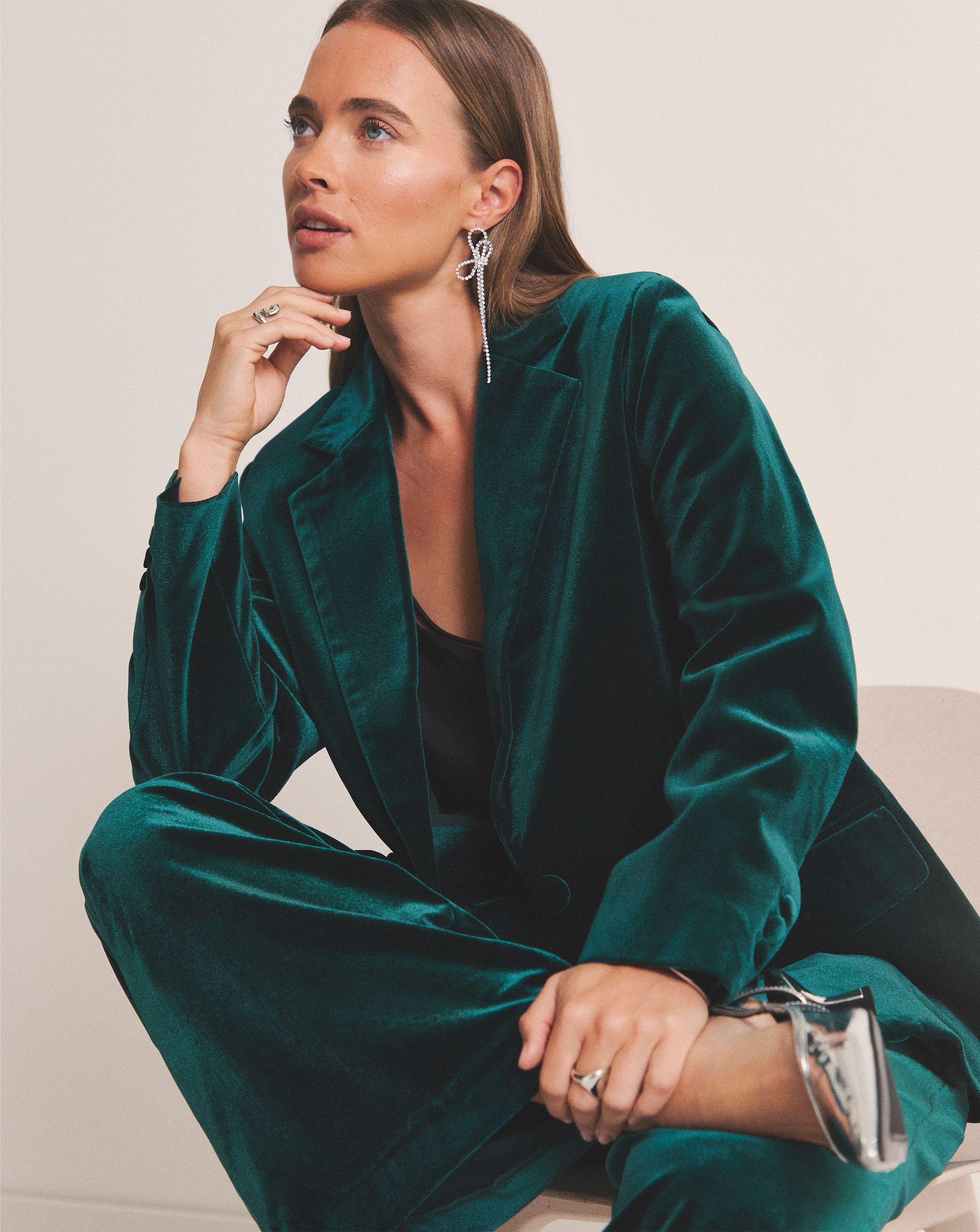 Model sitting Velvet Single Breasted Blazer