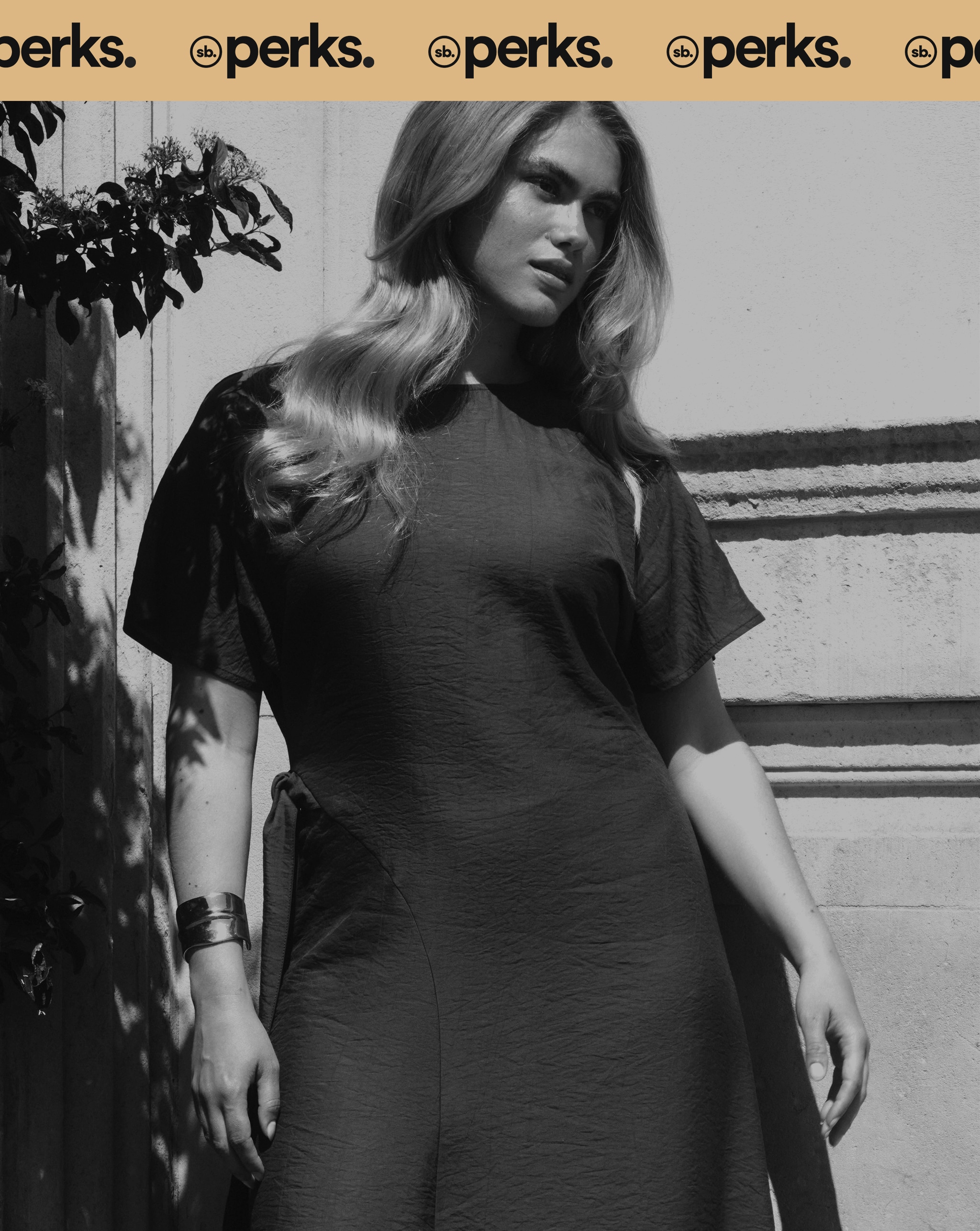 Perks. Model wears midi dress