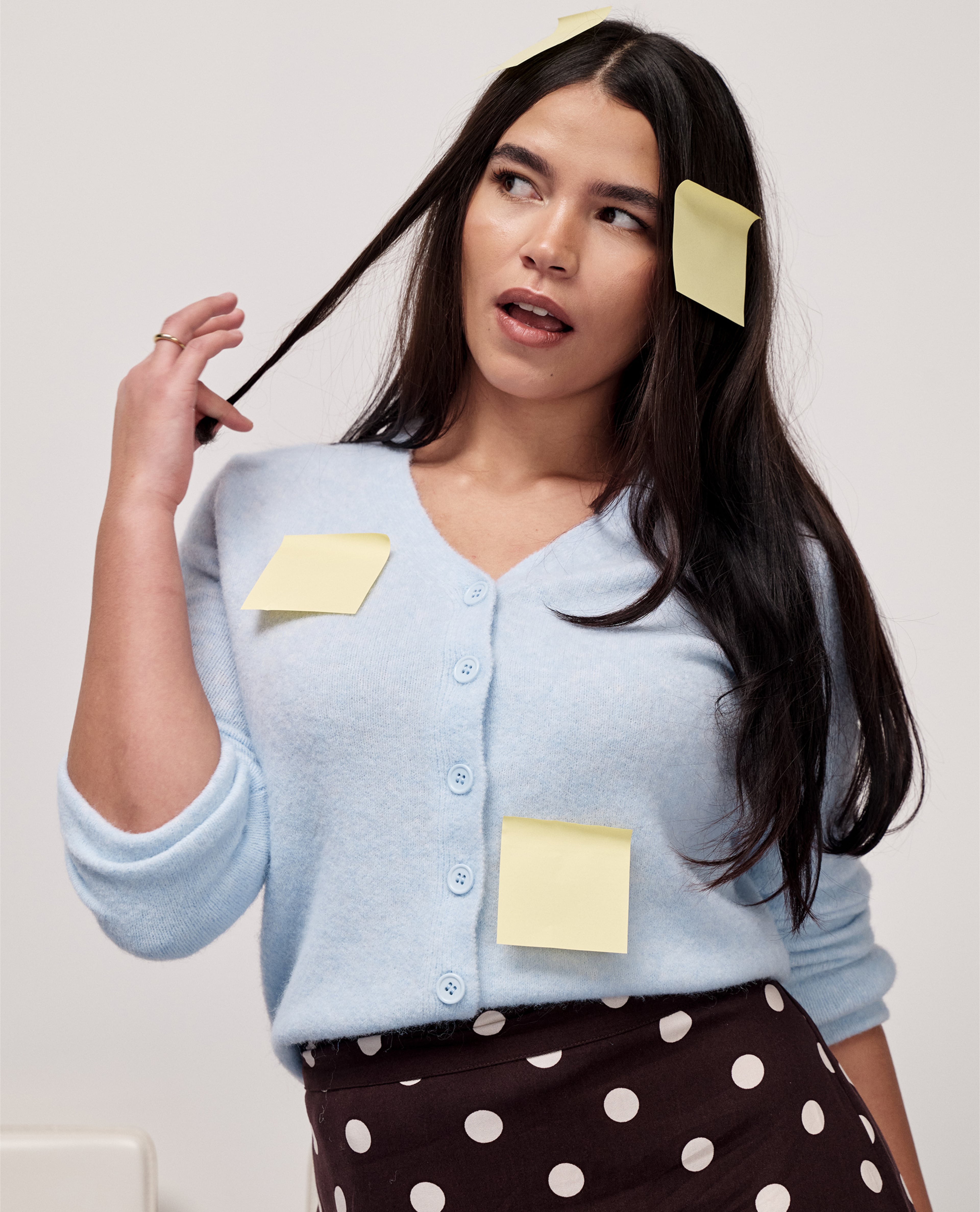 Model wears new season cardigan in pale blue