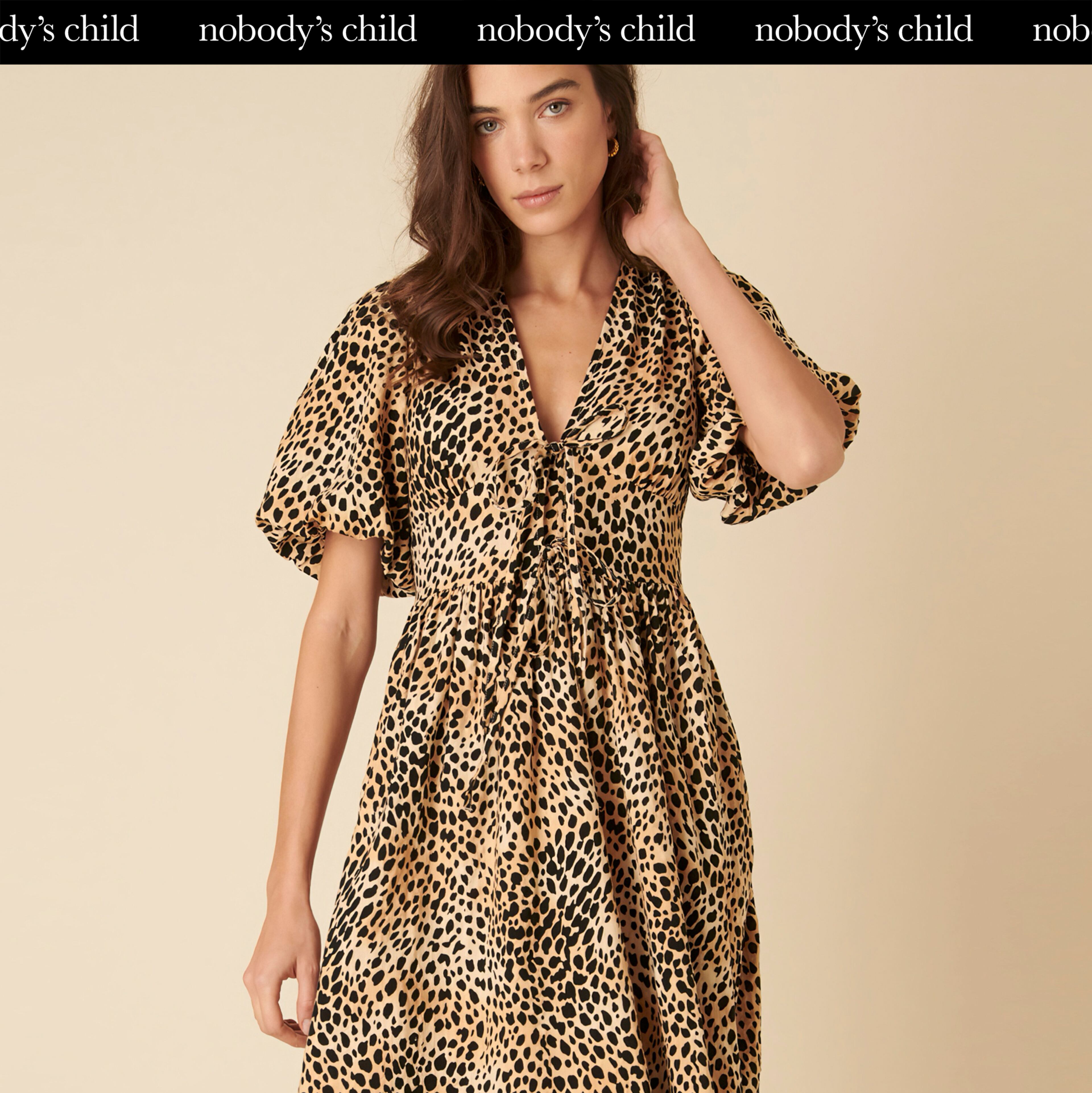 Model wears leopard print dress from Nobody's Child