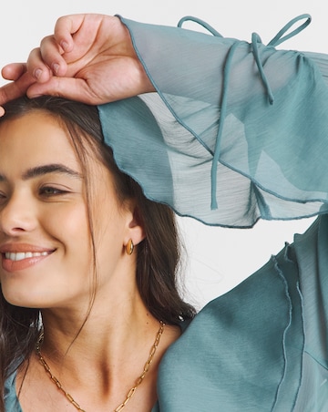 Teal Ruffle Front V Neck Blouse